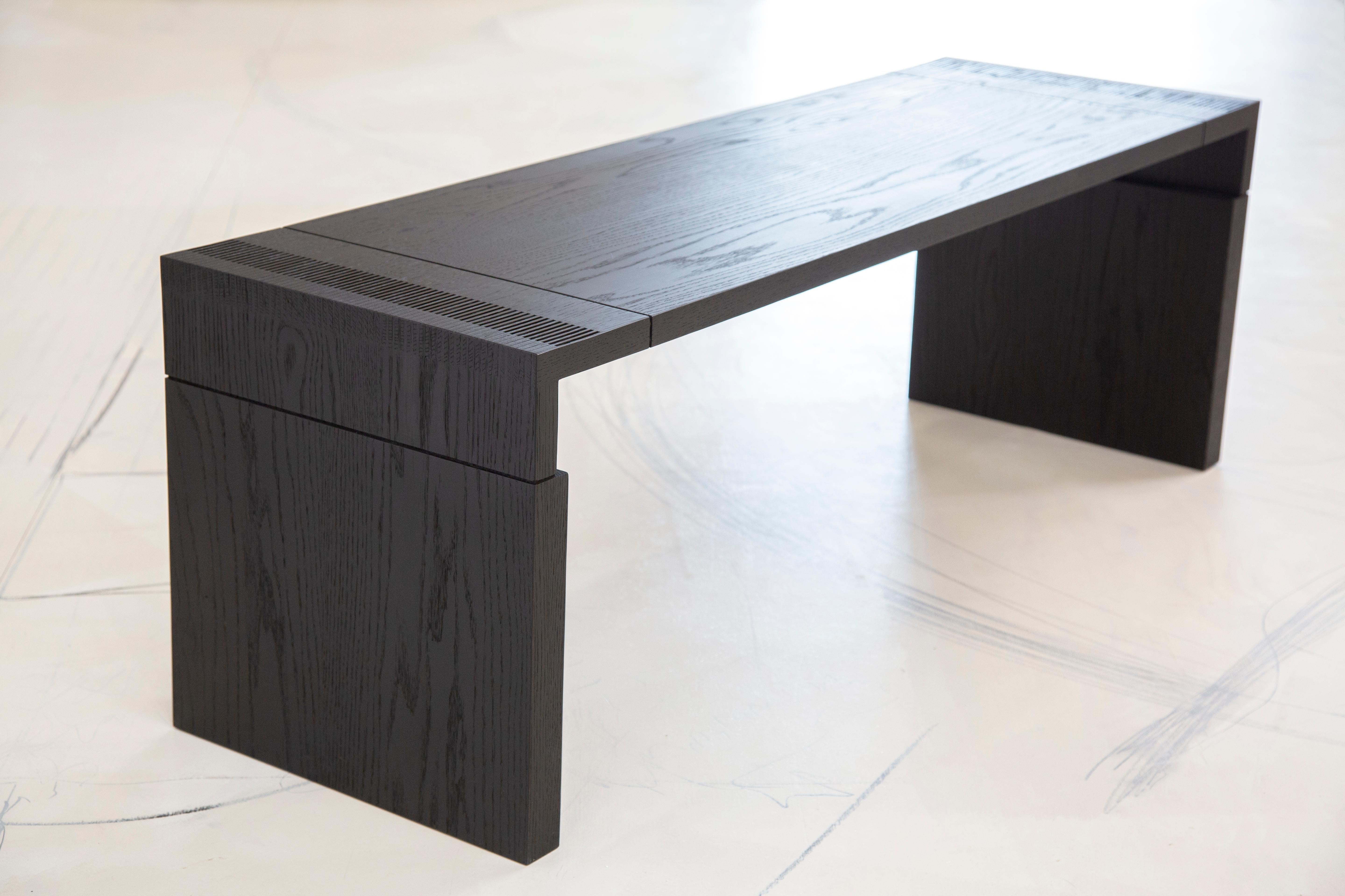 Made to order in Brooklyn, New York this customizable bench is handmade of solid wood with meticulously cut finger joints and subtle architecturally inspired details. 
Shown: 53
