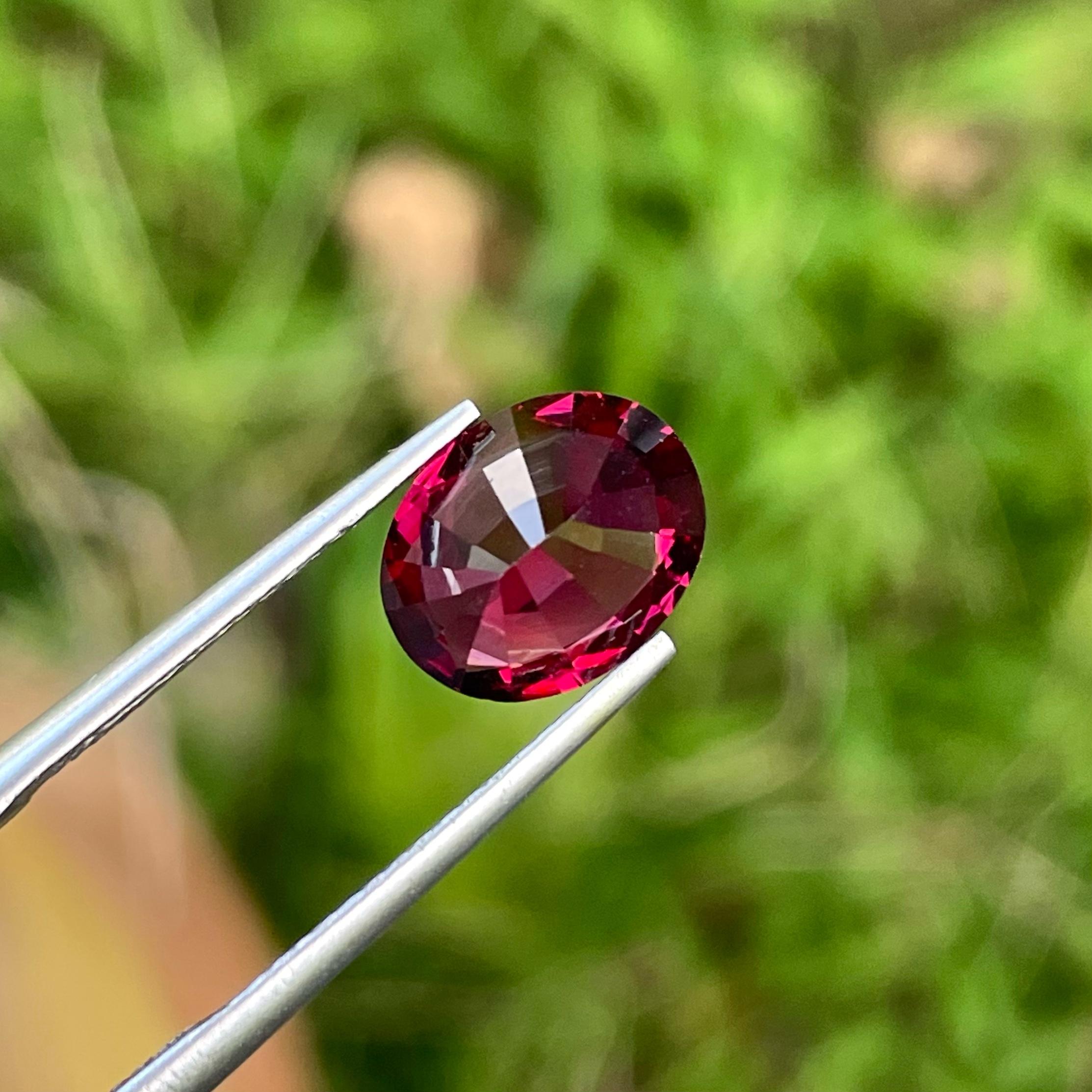 Modern Wellness of Bright Red Rhodolite Garnet 3.05 carats Oval Shaped Madagascar's Gem For Sale