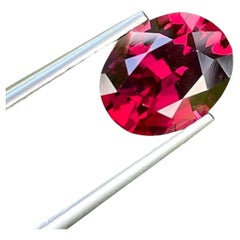 Wellness of Bright Red Rhodolite Garnet 3.05 carats Oval Shaped Madagascar's Gem