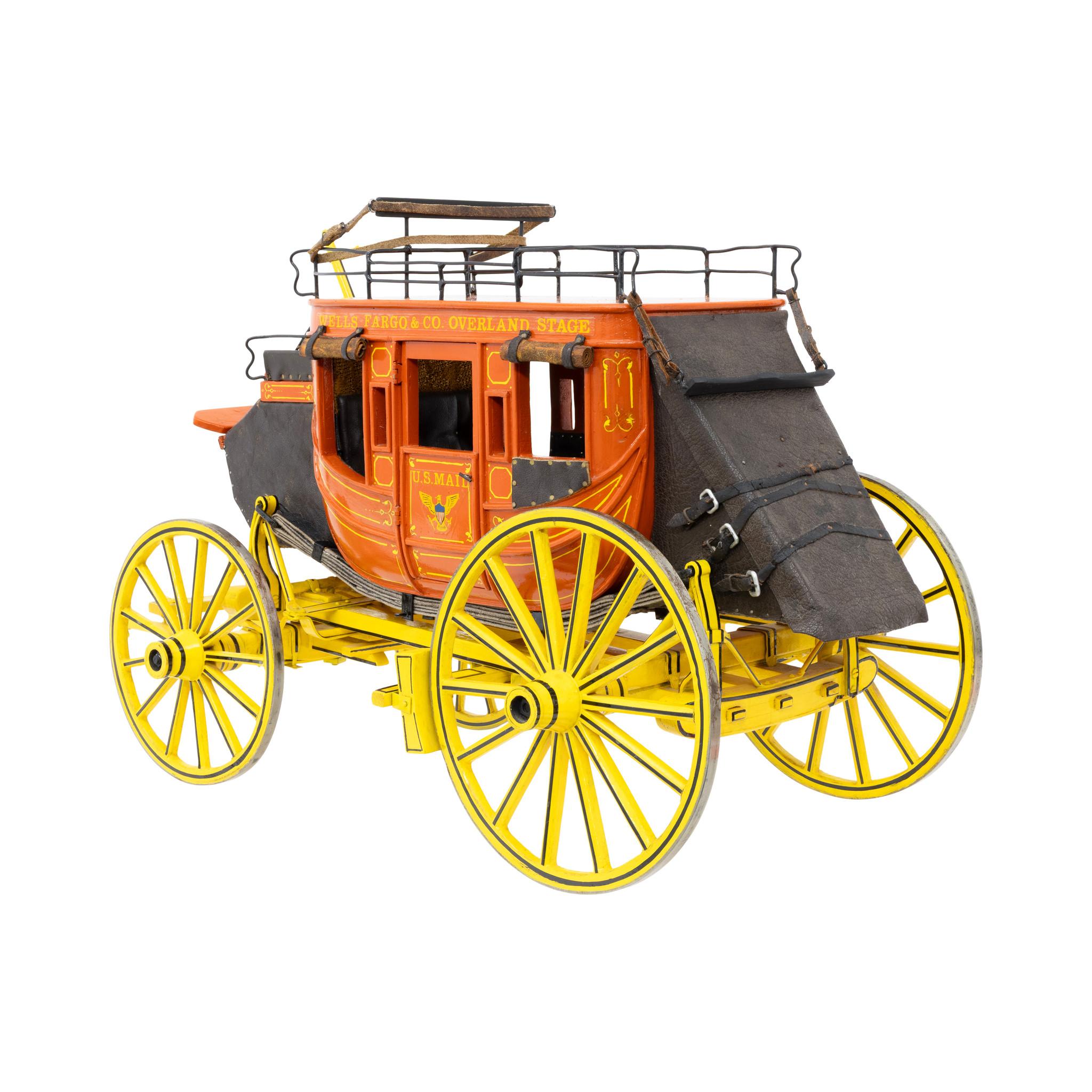 Wells Fargo & Co. Overland Stage stagecoach model by Jim Means of California. Exceptional hand-crafted wood, metal and leather stage coach model crafted to scale. Brightly painted in colors of red-orange and yellow with black leather. Metal artist