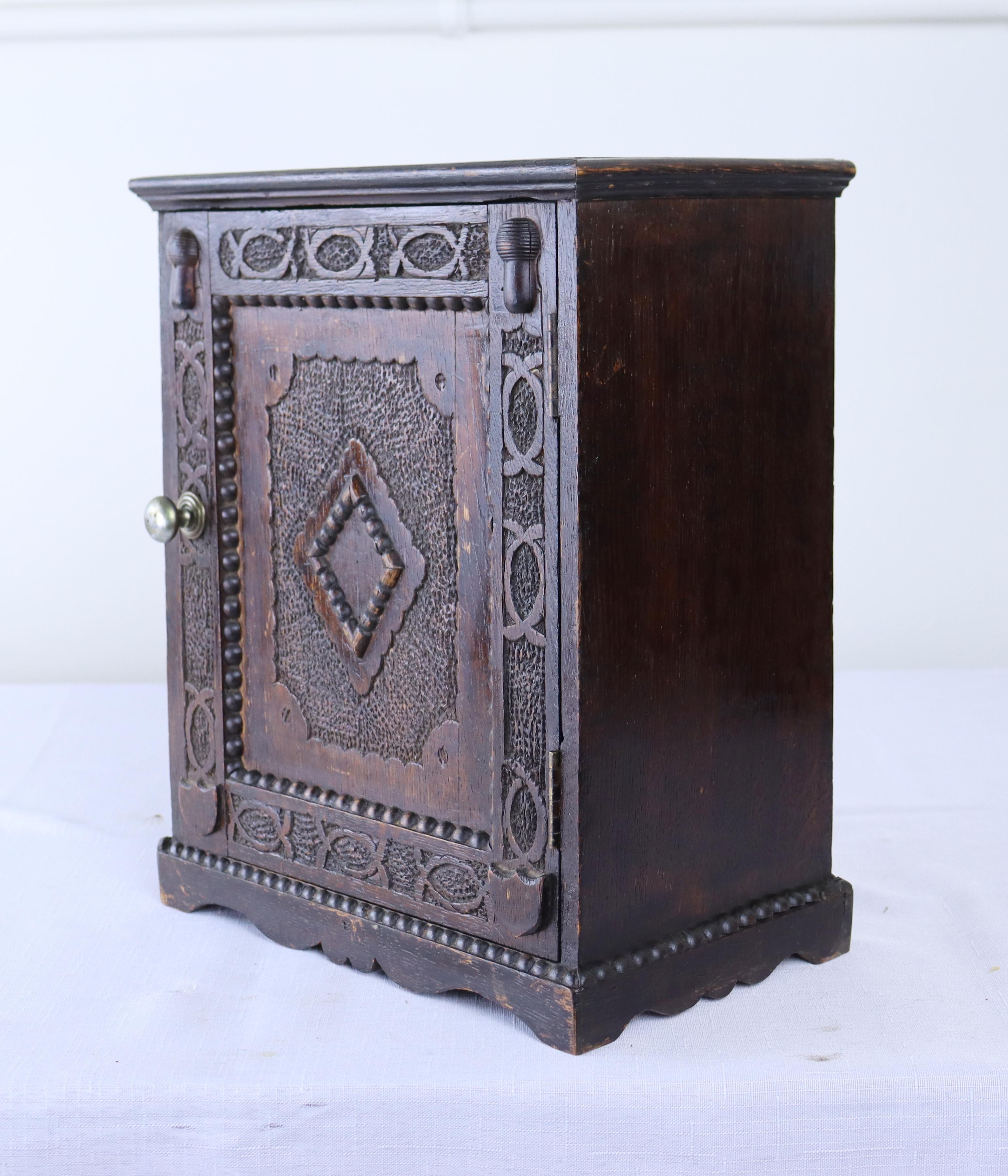 Stained Welsh Carved Medicine Cabinet with Interior Drawer For Sale