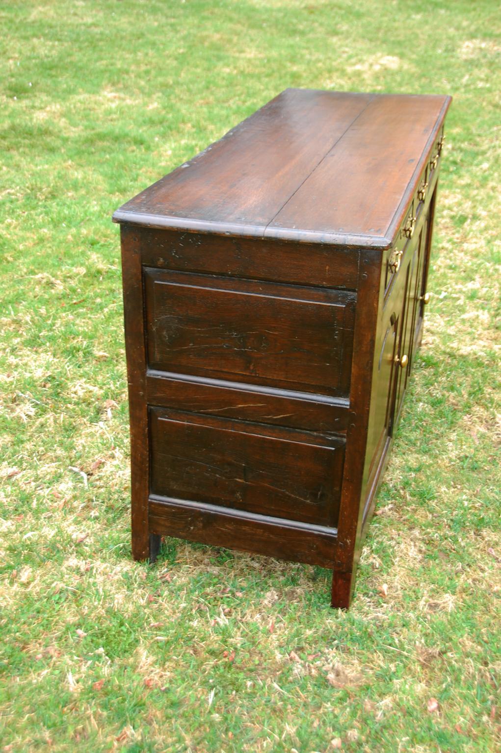 Welsh Georgian Oak Low Dresser with Three Drawers and Two Paneled Cupboard Doors In Good Condition For Sale In Wells, ME