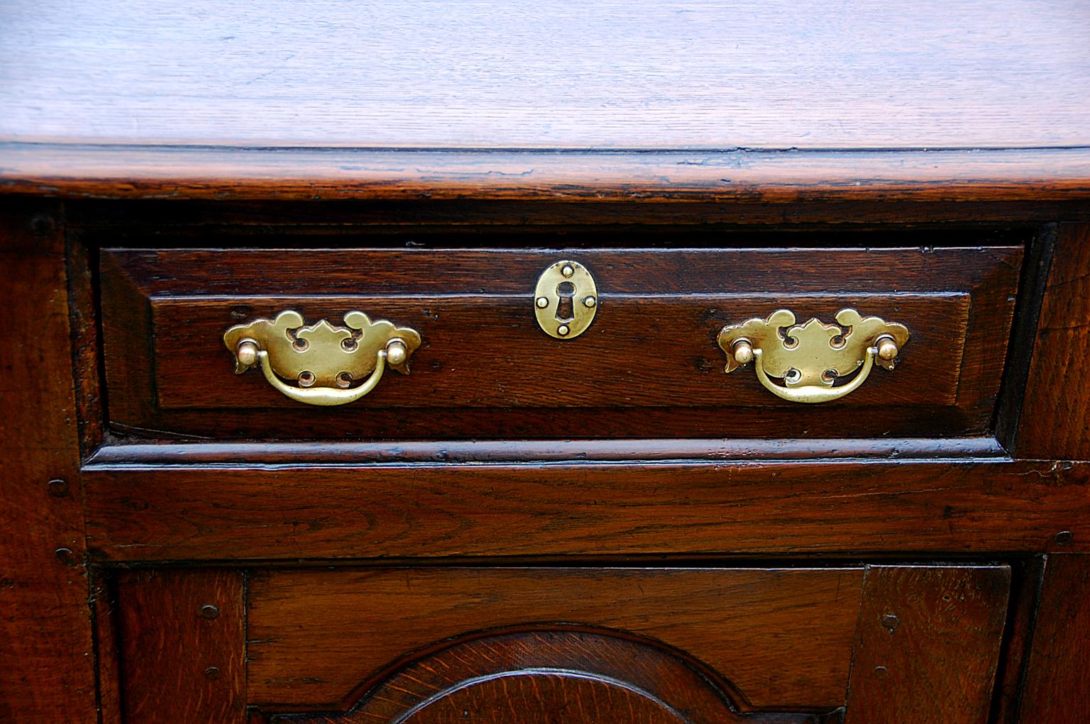 18th Century Welsh Georgian Oak Low Dresser with Three Drawers and Two Paneled Cupboard Doors For Sale