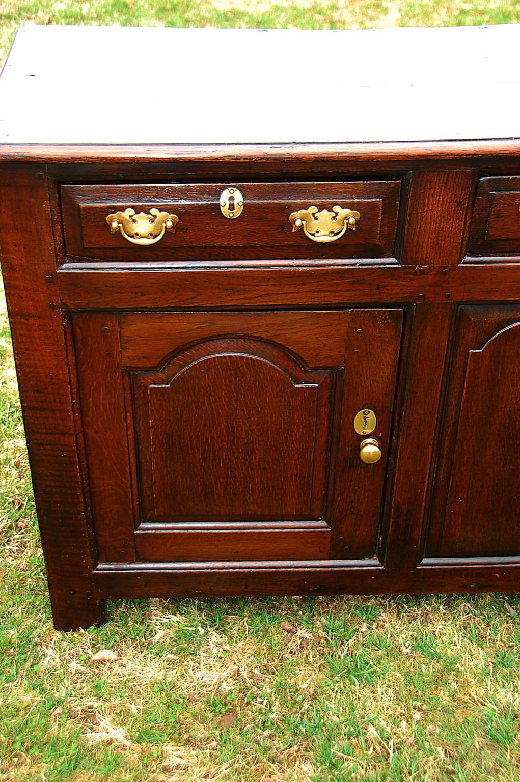 Welsh Georgian Oak Low Dresser with Three Drawers and Two Paneled Cupboard Doors For Sale 1