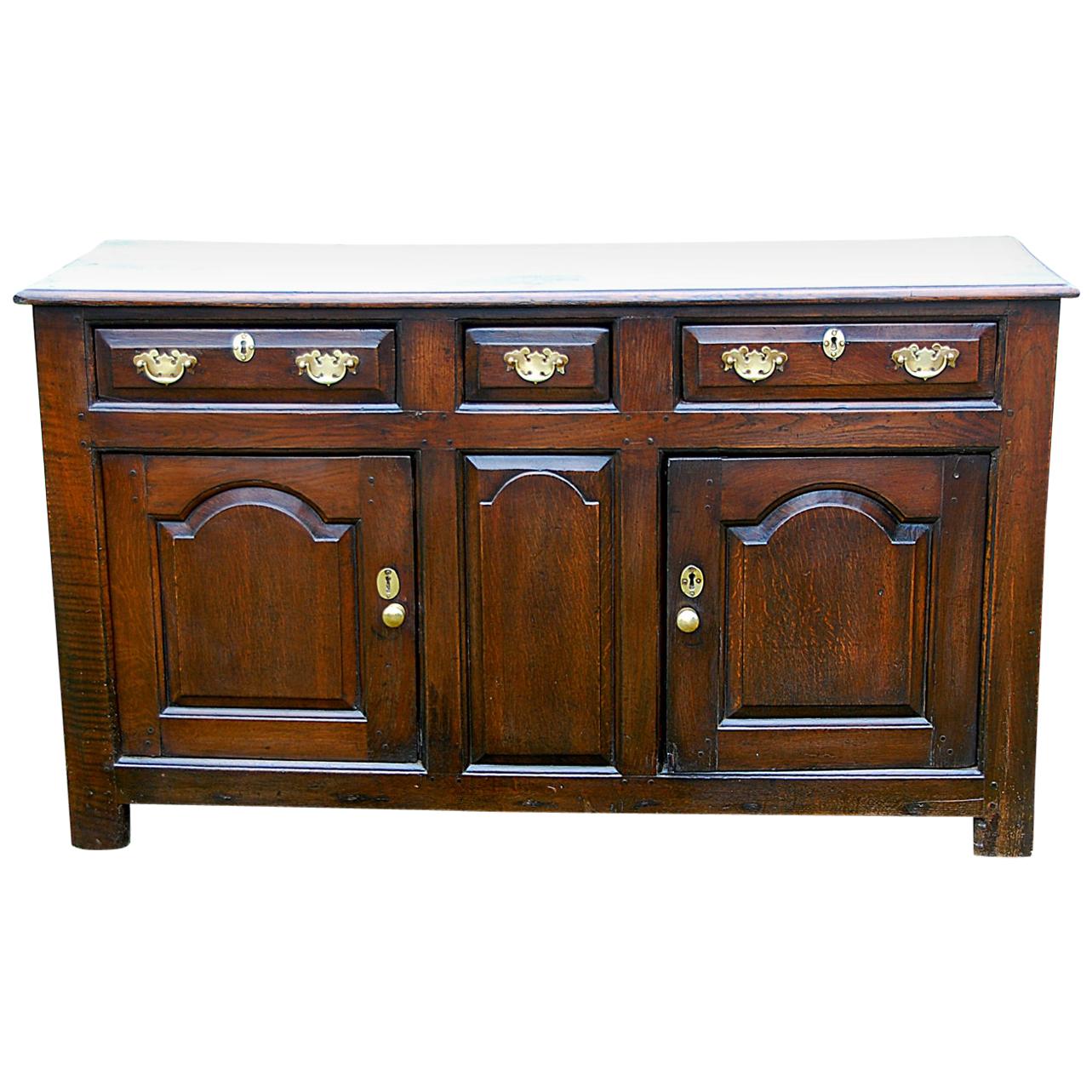 Welsh Georgian Oak Low Dresser with Three Drawers and Two Paneled Cupboard Doors