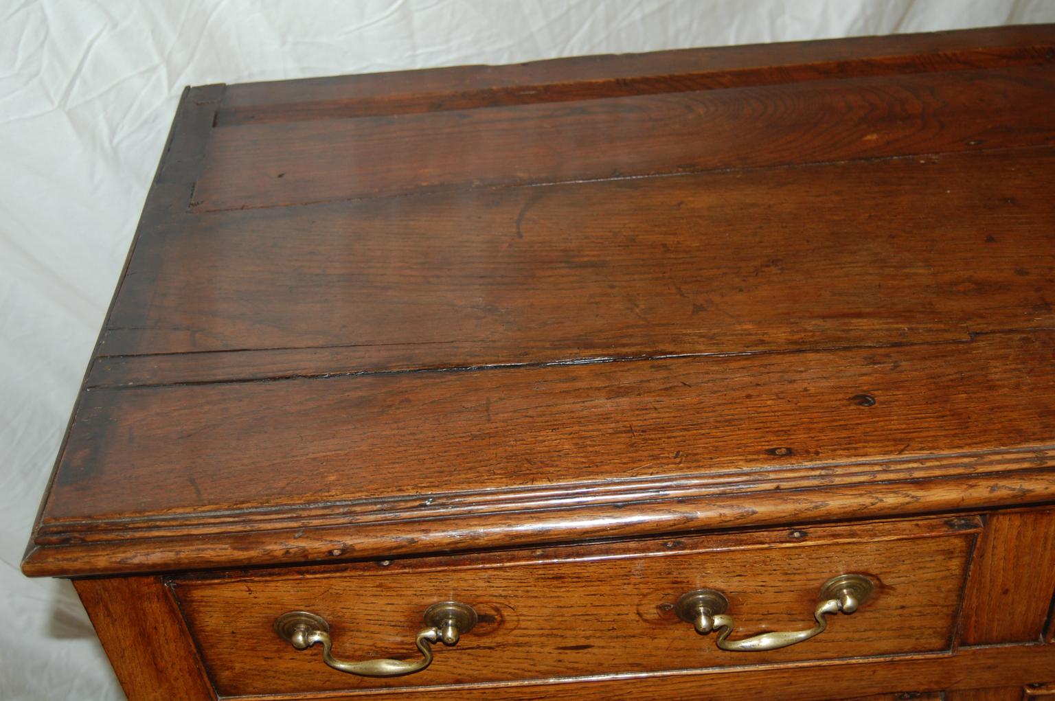 Brass Welsh Georgian Oak Potboard Dresser Base with Pierced Skirt Five Feet Long