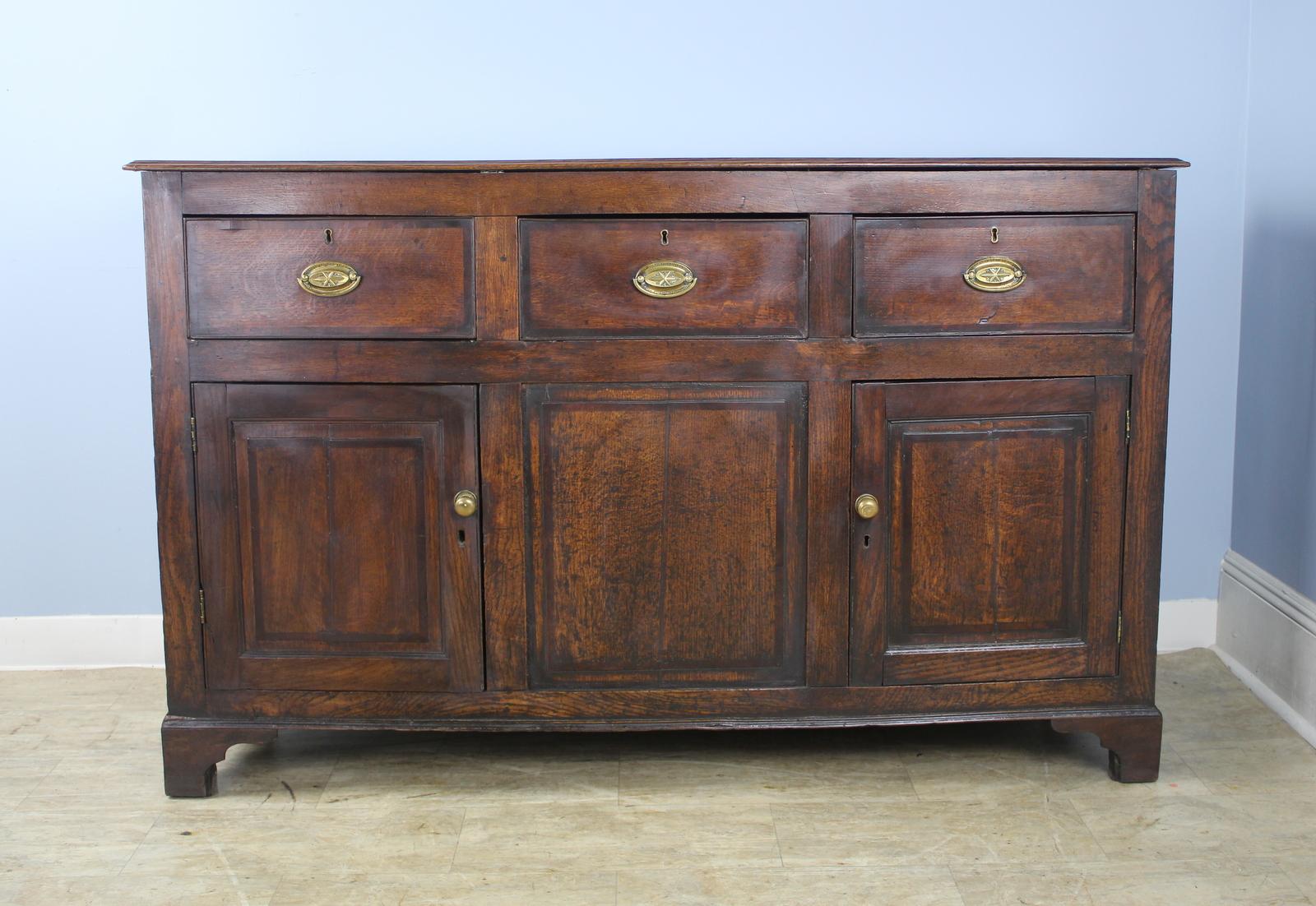 Welsh Oak Two Door Dresser Base, Mahogany Crossbanding and Original Brasses In Good Condition In Port Chester, NY
