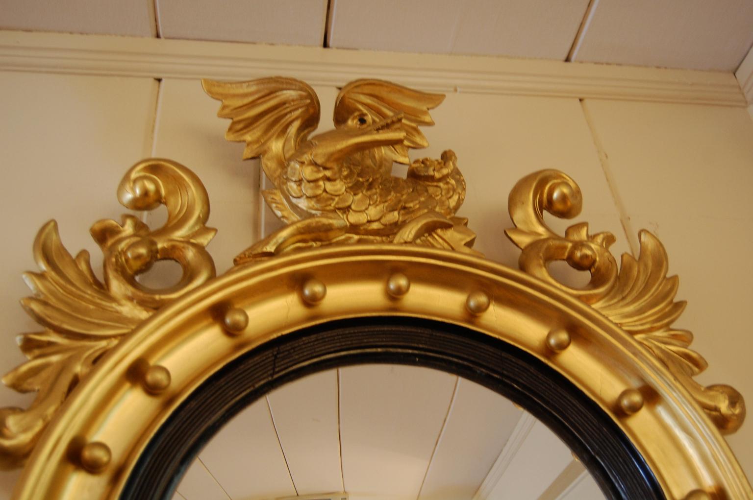 Welsh convex gilt mirror with the symbol of Wales, the winged dragon (sometimes called the dragon of Cadwalader