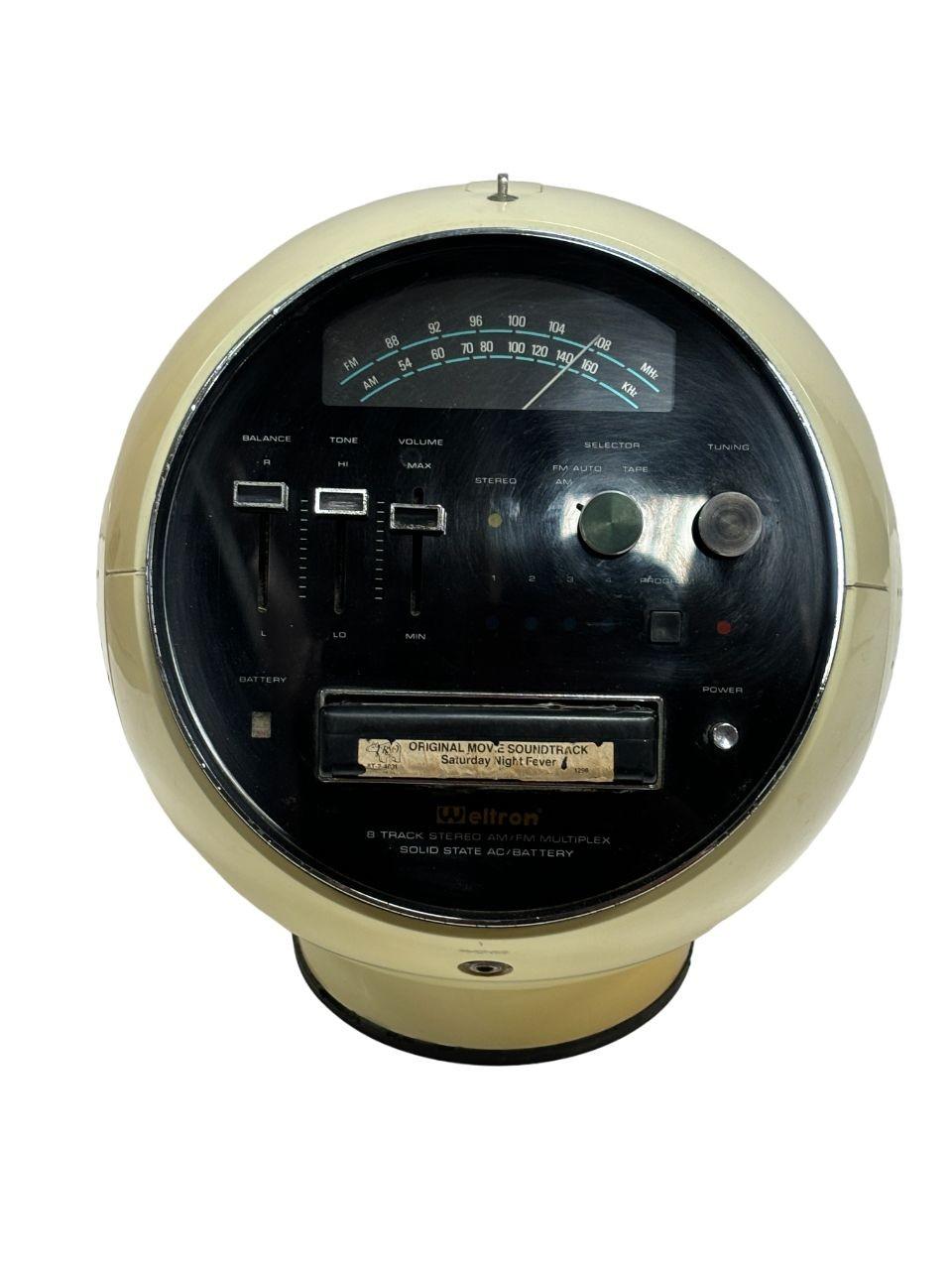 Introducing the Weltron Model, a fully functioning ultra-modern space ball AM/FM stereo with an integrated 8-track player. This rare audio gem from the iconic Weltron brand boasts cutting-edge technology and a sleek design that stands out in any