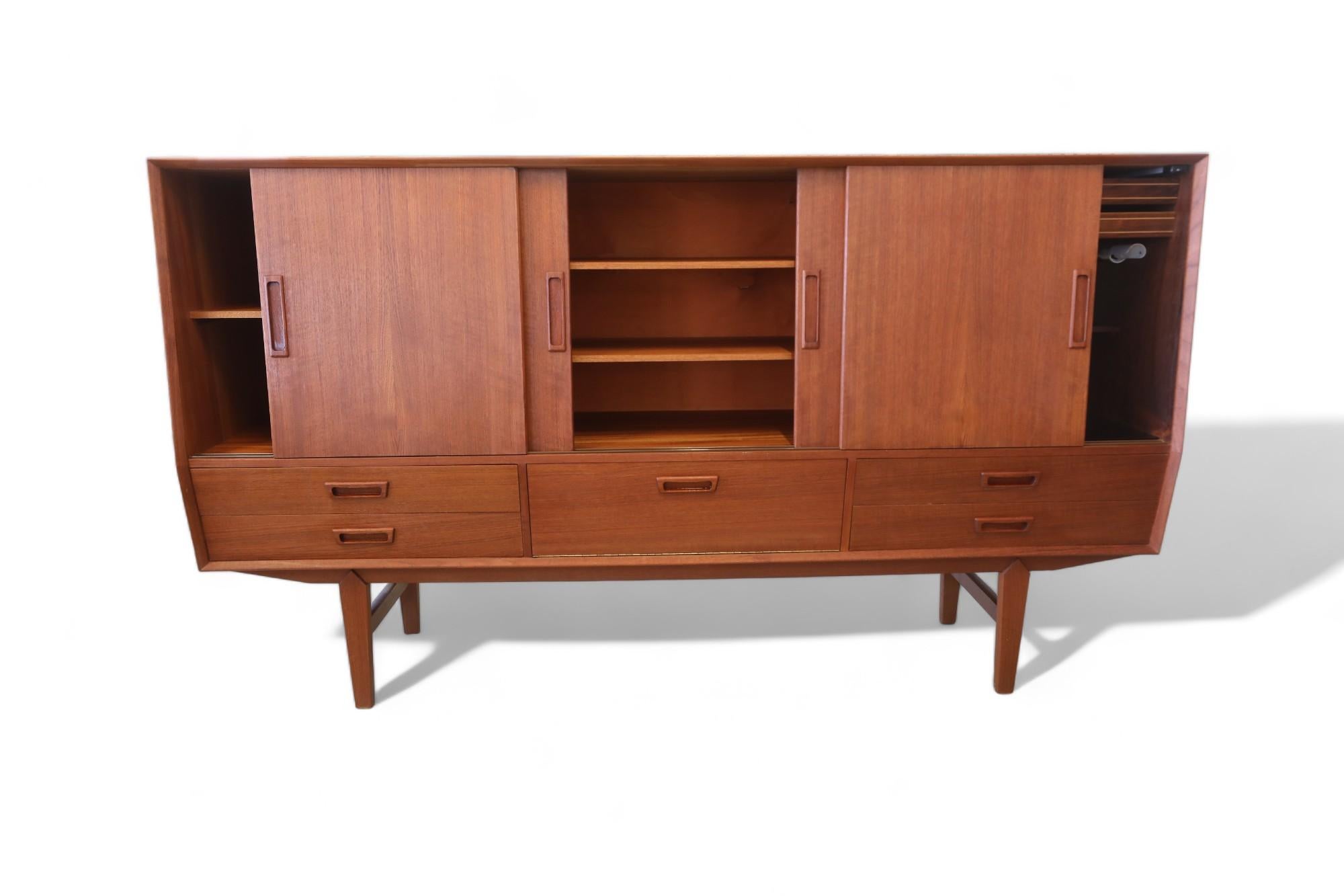 Mirror Wemb Møbelfabrik sideboard in teak with illuminated bar cabinet. For Sale