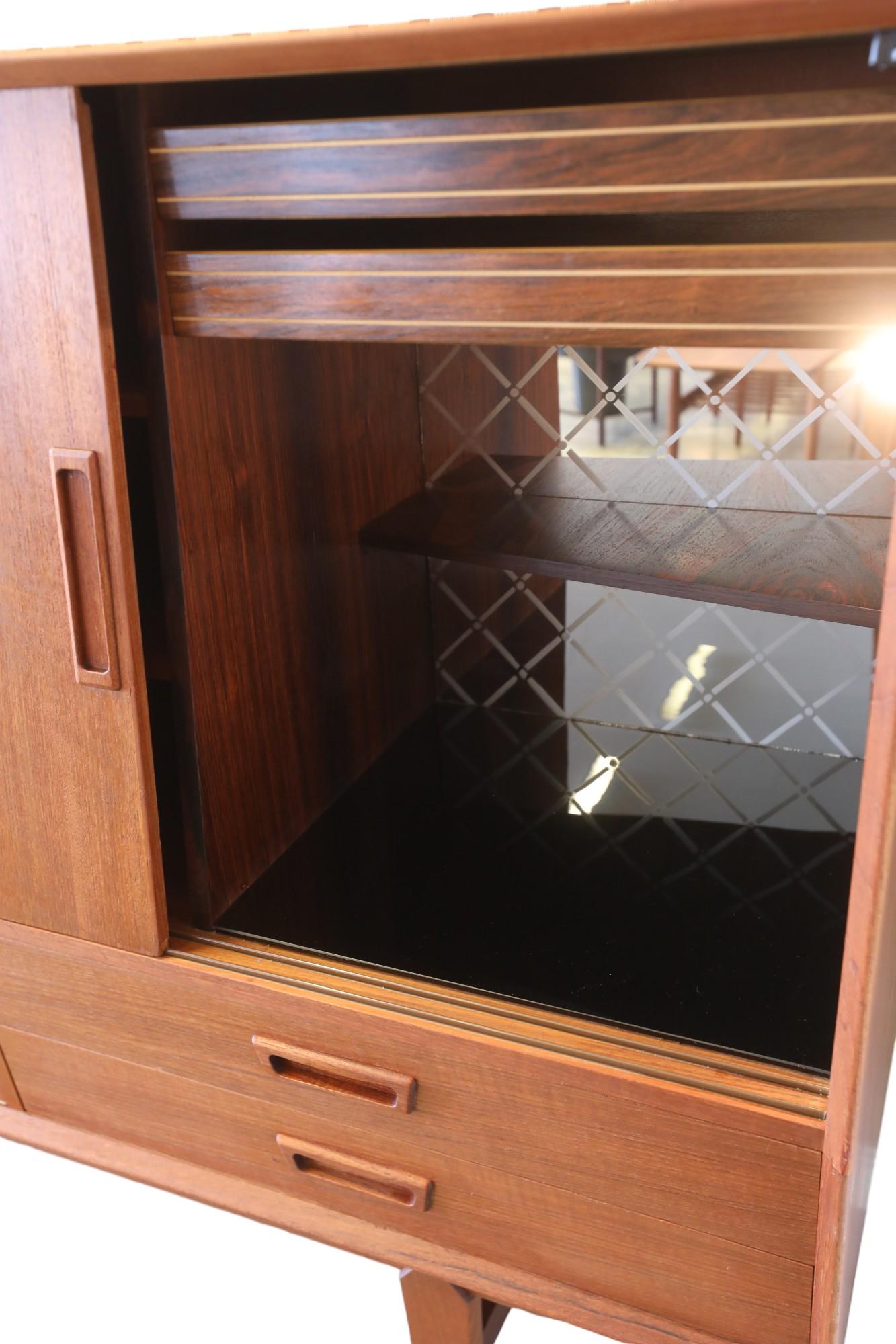 Wemb Møbelfabrik sideboard in teak with illuminated bar cabinet. For Sale 1