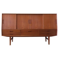 Wemb Møbelfabrik sideboard in teak with illuminated bar cabinet.