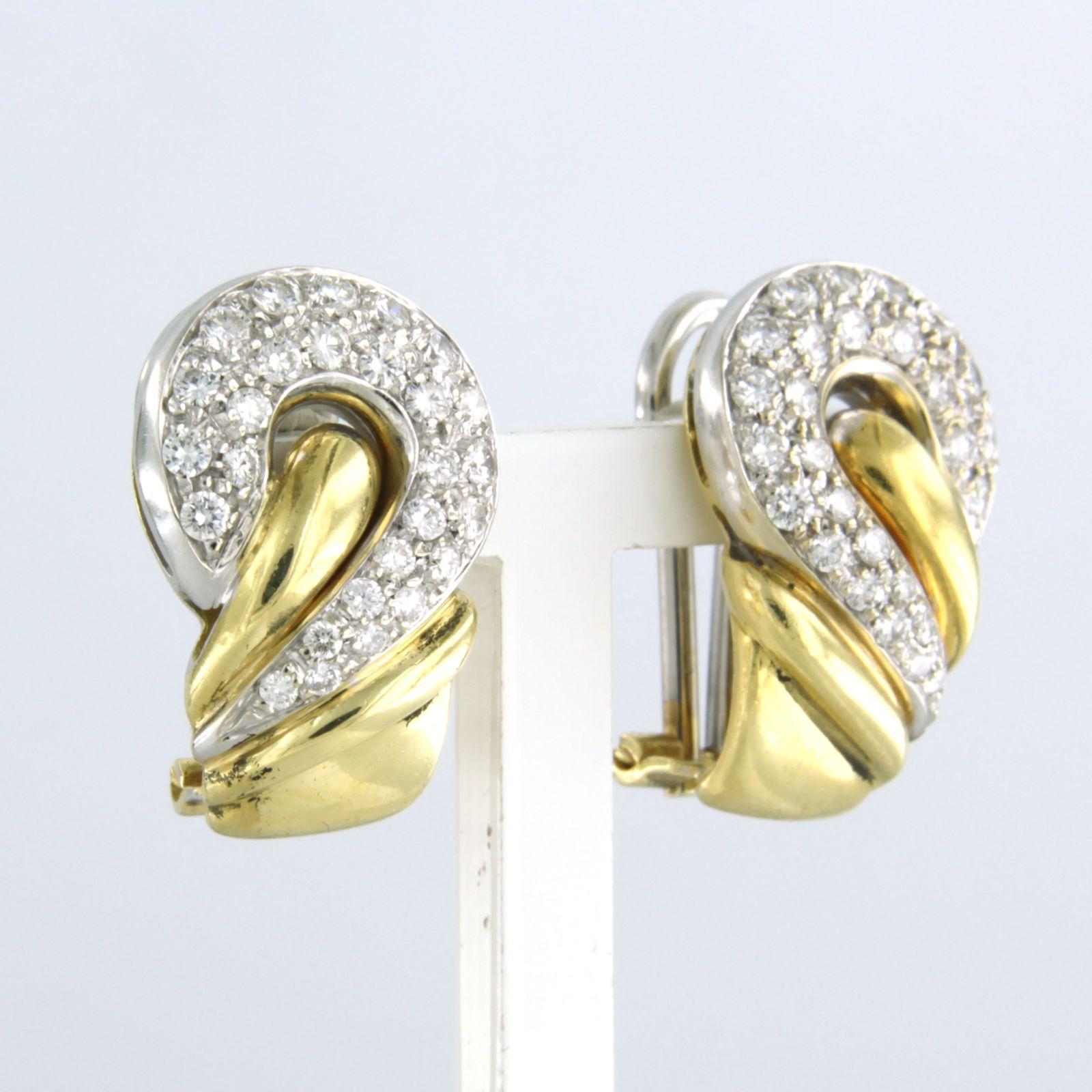 Modern Wempe - 18 kt bicolour gold ear clips set with brilliant cut diamond 1.00 ct For Sale