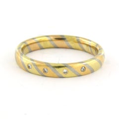 WEMPE – 18k tri-color gold band ring with brilliant-cut diamonds up to 0.02ct