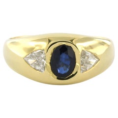 WEMPE - Anillo de oro amarillo de 18k engastado con zafiro 1,10ct y diamante talla triángulo