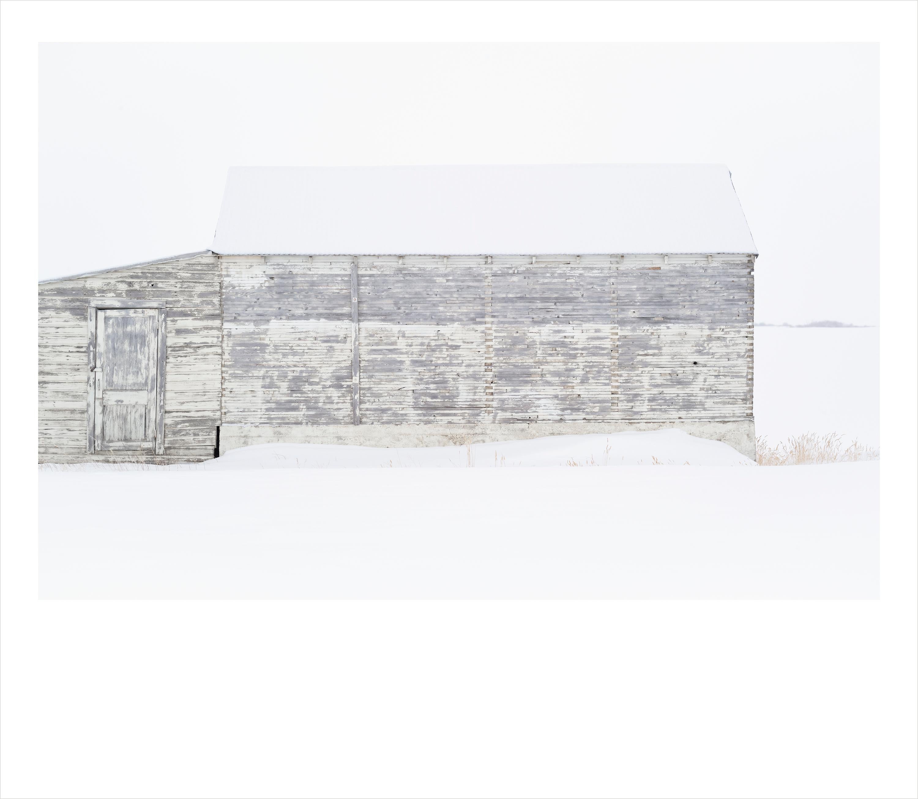 Wendel Wirth Landscape Photograph - White Barn III- minimalist photograph of barn in shades of white 