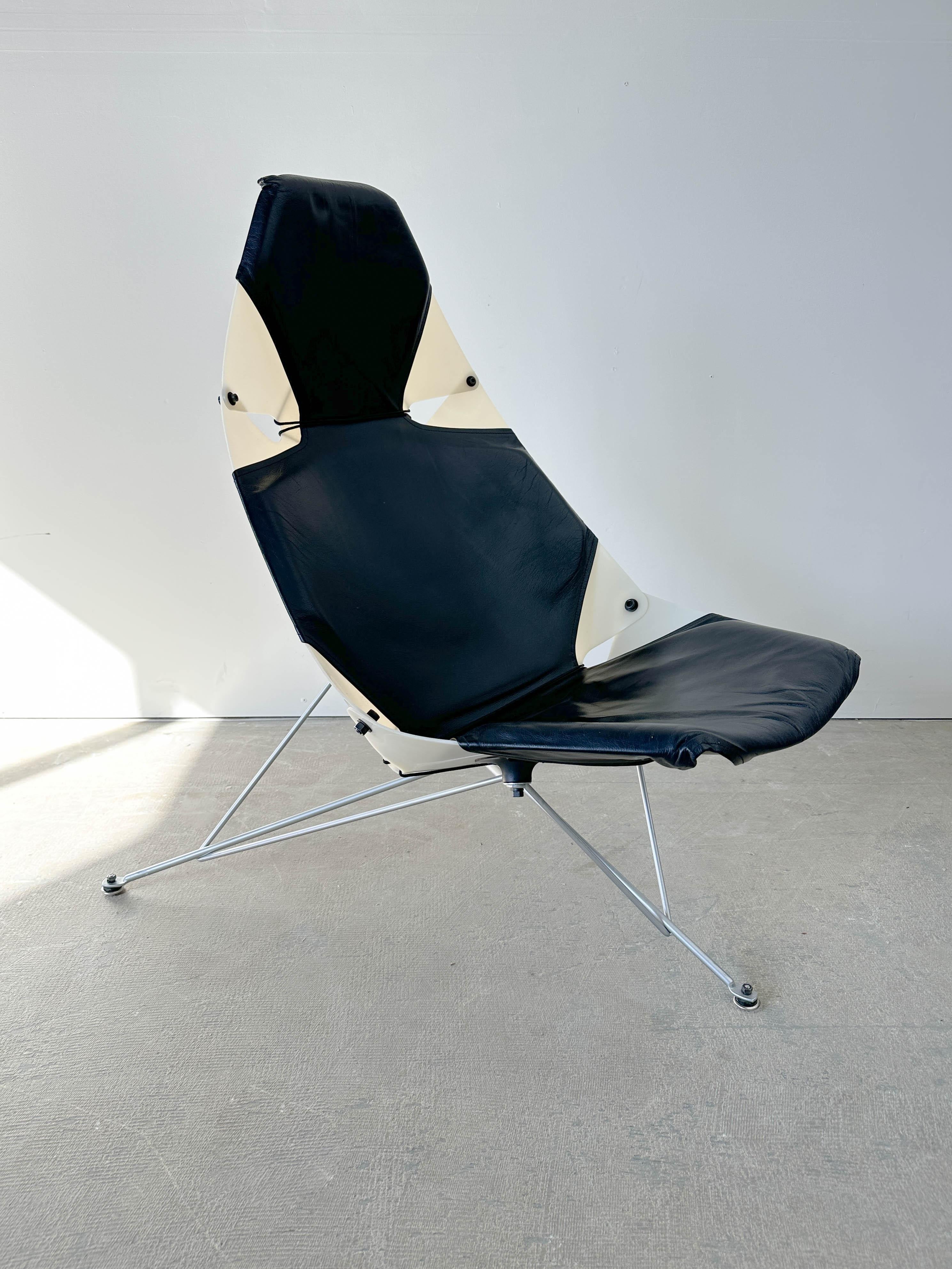 Strikingly unique 'Bikini' chair designed by Seattle based architect Wendell Lovett and designed in the 1950s. Original 1950s production was limited to around 20 chairs and the plastic shell tended to fail dramaticaly, shattering in to small pieces