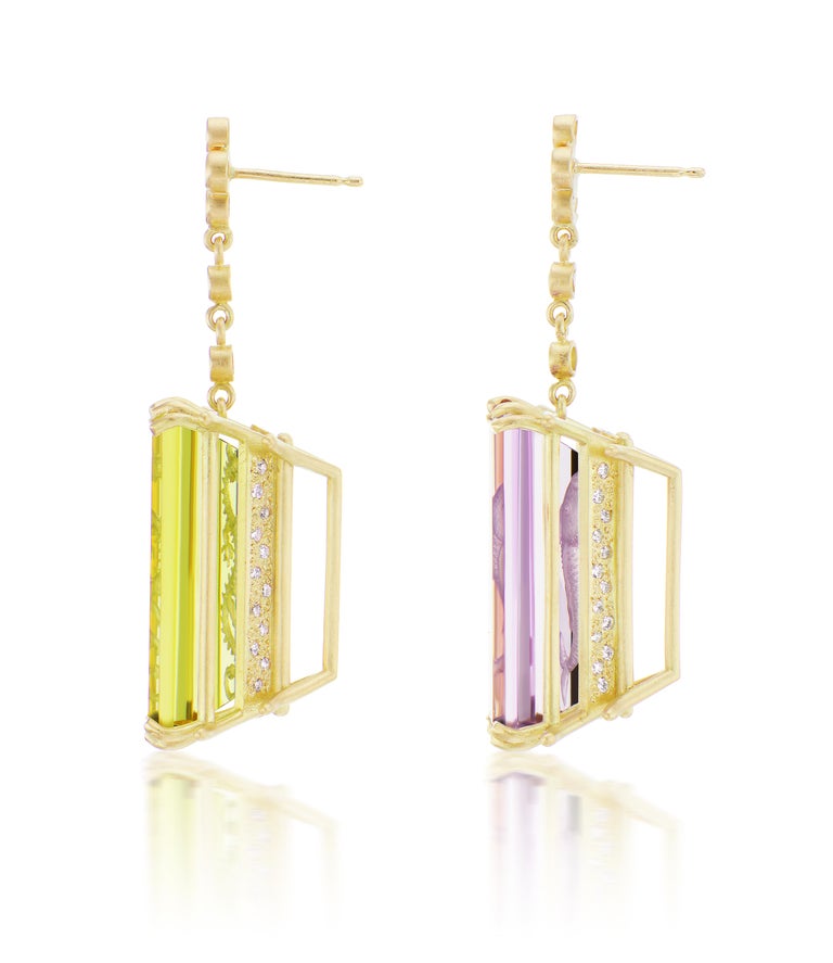 These intentionally mismatched amethyst and citrine earrings were inspired by the elusive image of Queen Min, the last queen of Korea.  Even though the queen lived in the age of photography, no one is 100% sure what she looked like. Accordingly,