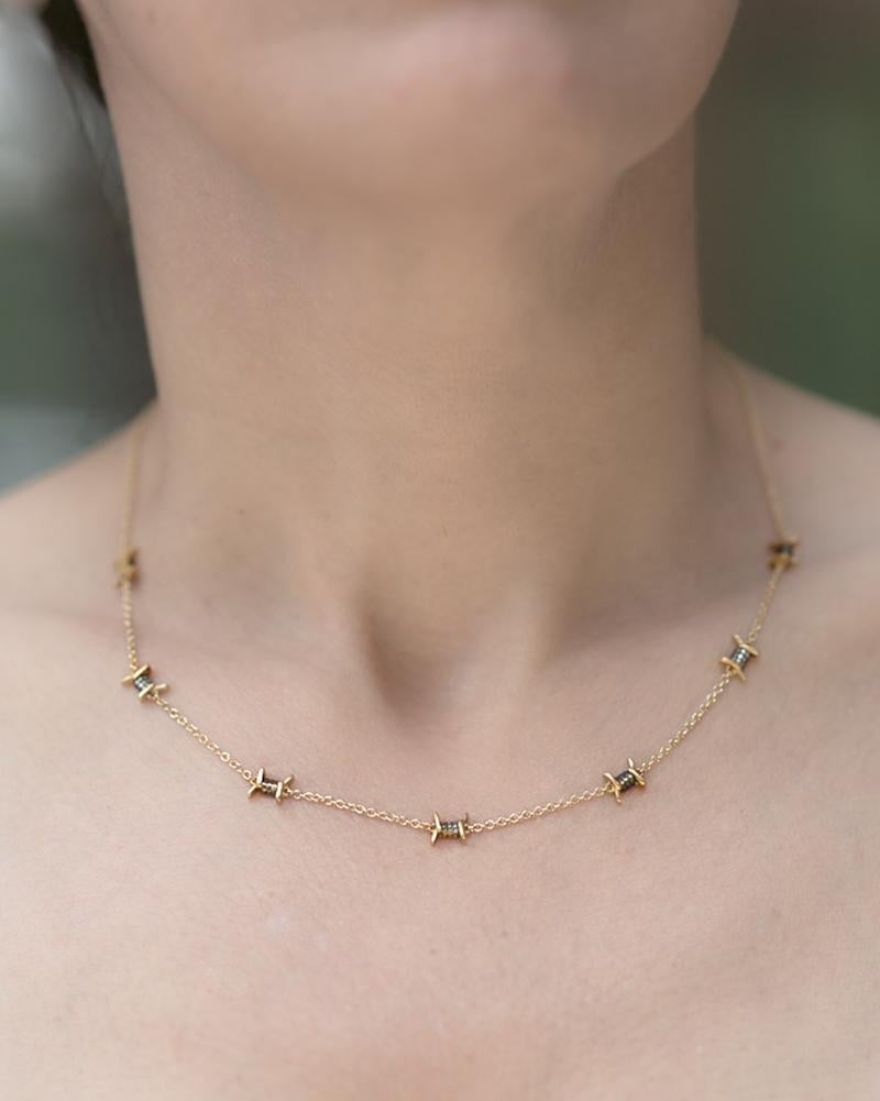 gold barbed wire necklace