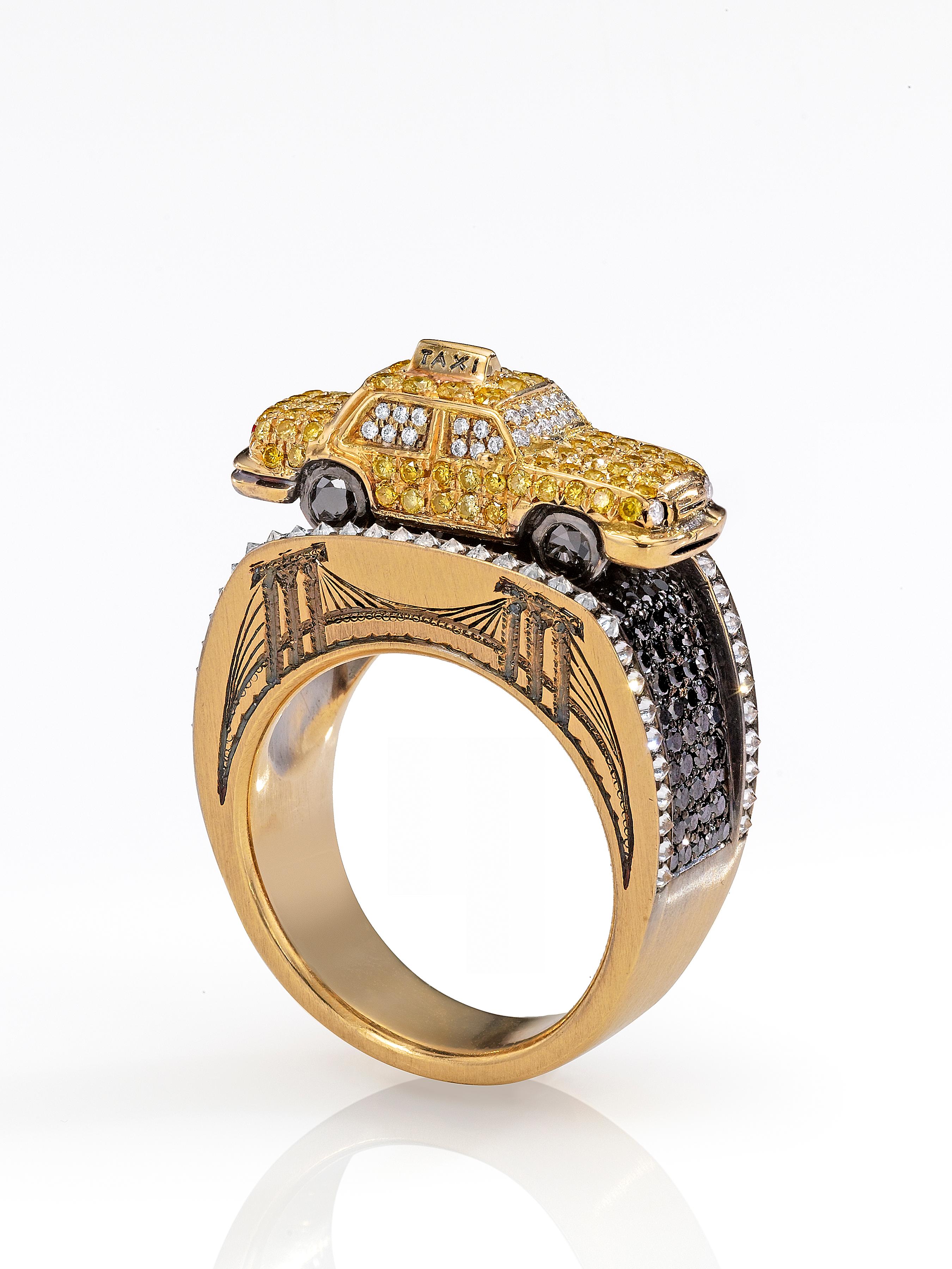 23 grammes d'or jaune et blanc 18K, finition satinée.
92 diamants jaunes, totalisant 0,59 carats.
92 diamants blancs, totalisant 0,46 carats.
130 diamants noirs, pour un total de 1,04 carats.
2 petits rubis.
Taille 6.
Unique en son genre.
Fabriqué à