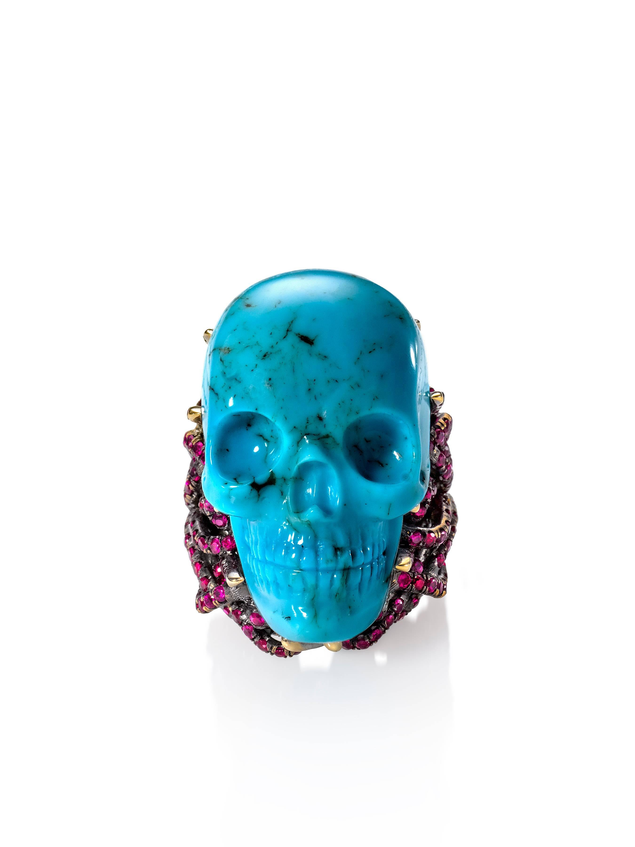 18k yellow gold, satin finish.
Hand-carved turquoise skull.
192 custom-cut rubies, totaling 1.94 carats.
Size 6.
One-of-a-kind.
Made in New York City.
As seen on supermodel Bella Hadid on the cover of Paper Magazine.
As seen on blogger Judith Boyd