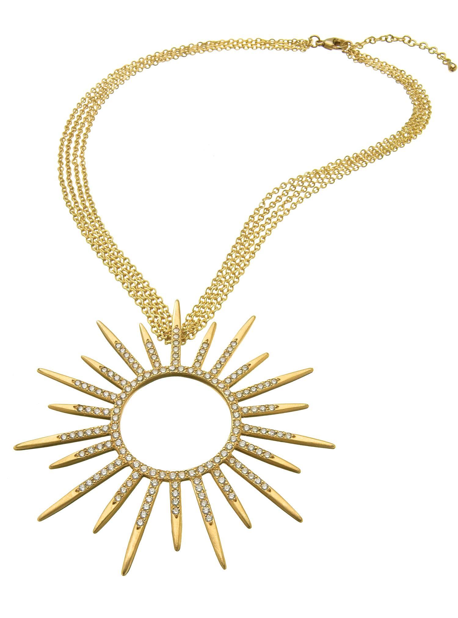 Like many of Wendy's designs, this starburst pendant was inspired by a brilliant woman -- Queen Elizabeth I. Her artisans in New York City sat with Wendy for hours discussing proportion, creating balance with a multi-strand chain, and planning where