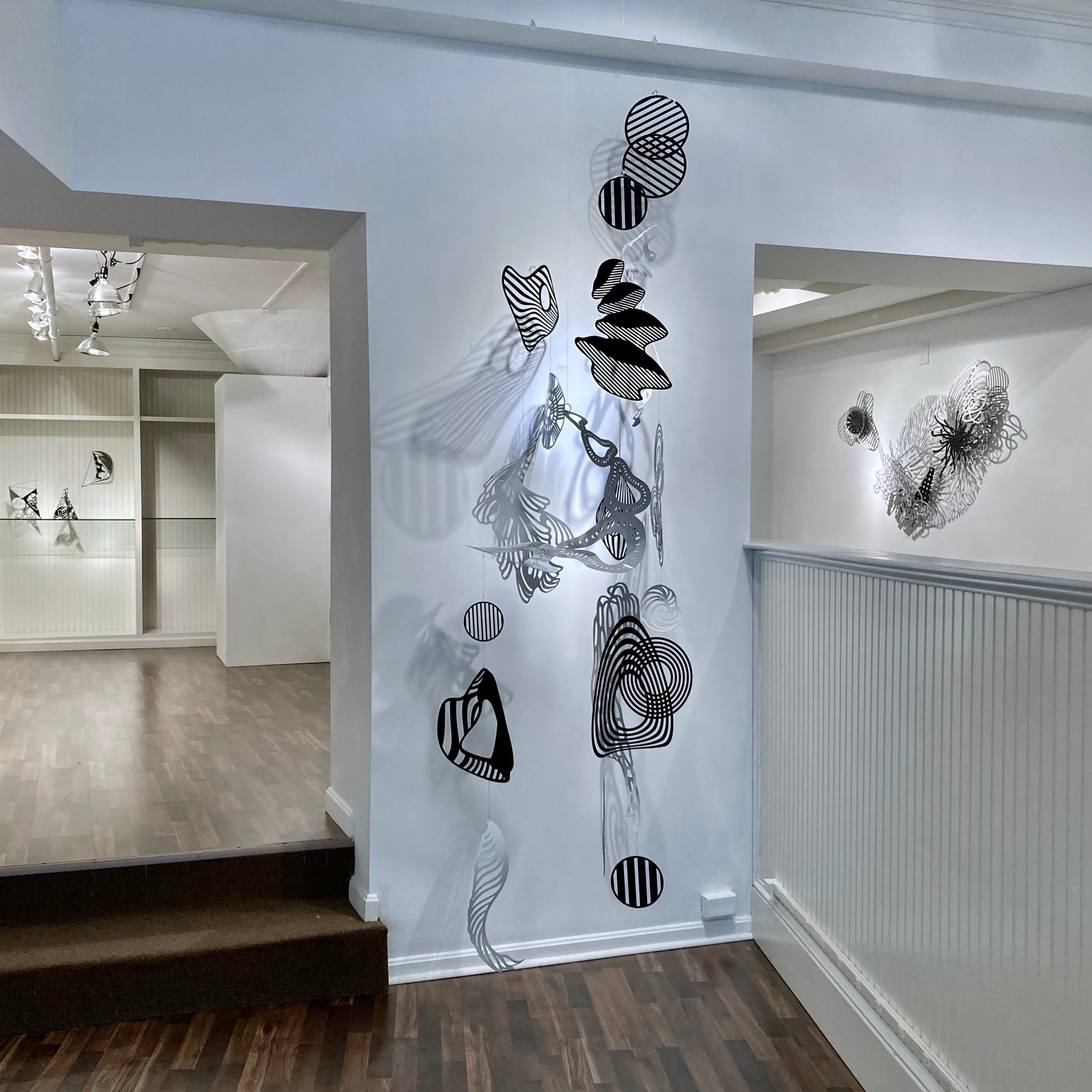 Wendy Letven Abstract Sculpture - "Taxonomy"  Hanging Aluminum Mobile, Black & White, 9' Tall, Dimensions Variable