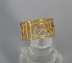 Wendy Ramshaw Gold Band Ring on Lucite Stand