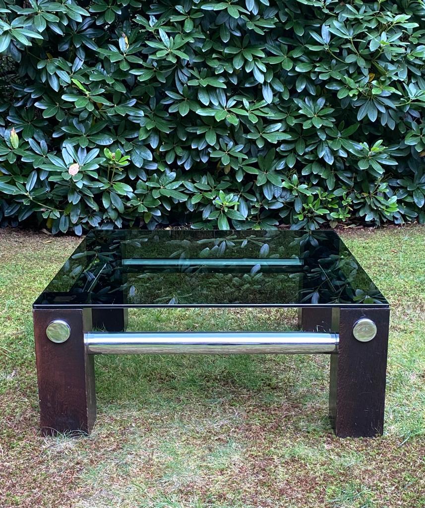 Wengé and smoked glass coffee table by Martin Visser for Spectrum circa 1970s. Very nice Modernist table with contrasting chrome tubes. The piece remains in good condition but shows some wear to it’s base and some scratches to the table top as shown