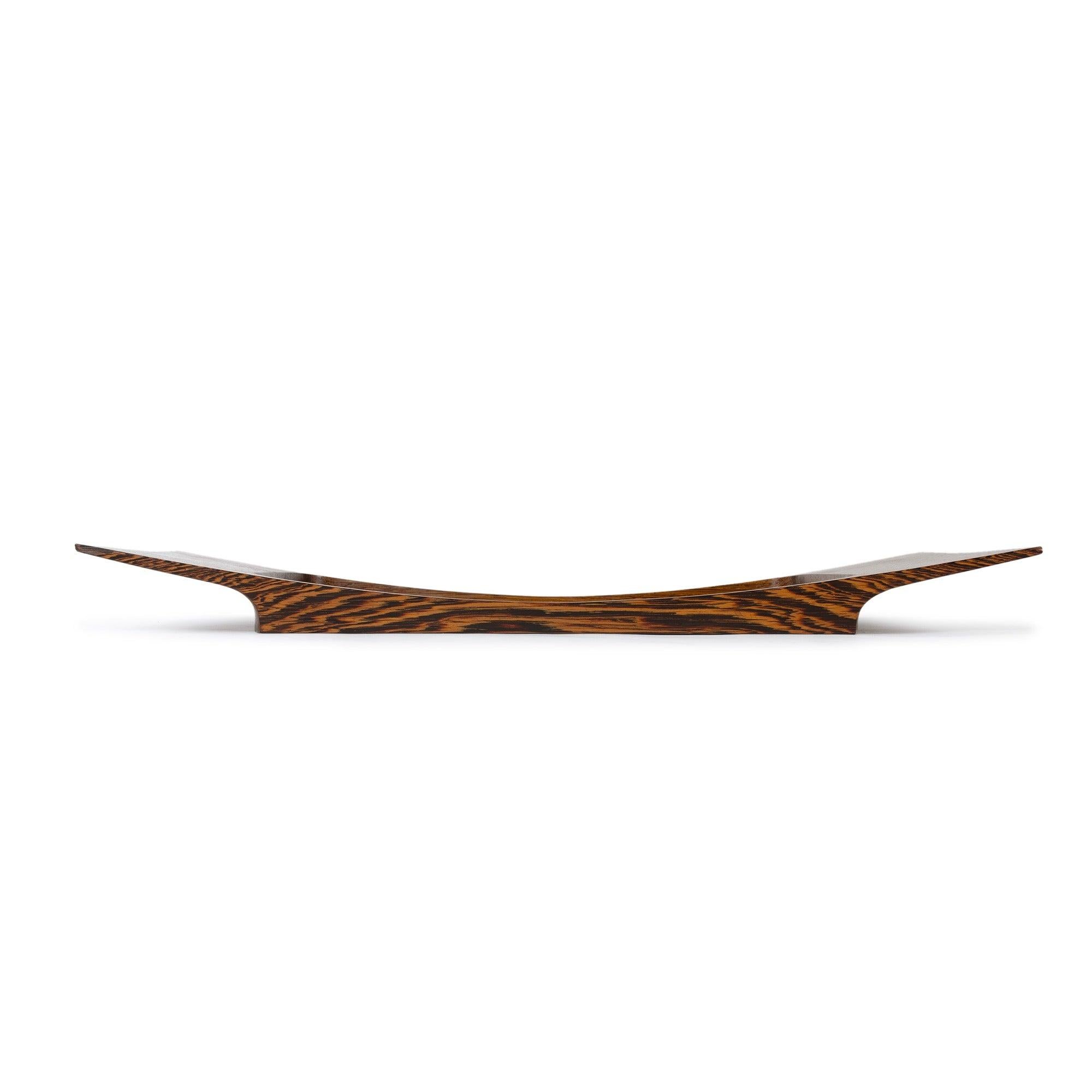A substantial tray masterfully carved of vividly grained African Wenge.