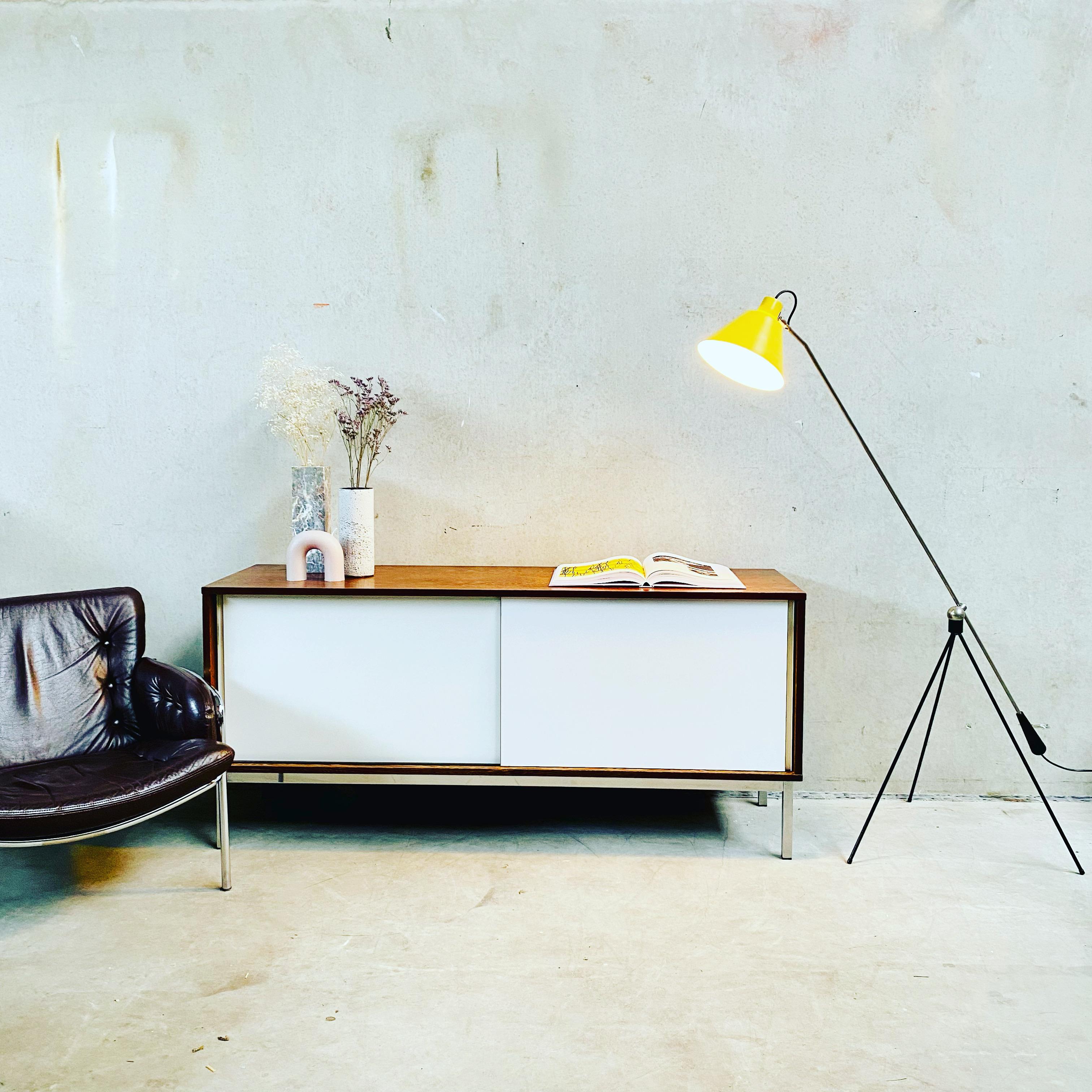 KW80 credenza by Martin Visser for 'T Spectrum Nederland in the sixties. This credenza is made of wenge laminated wood and chromed metal. A remarkable storage unit with shelves and drawer. The Dutch design brand Spectrum mainly sells designs from