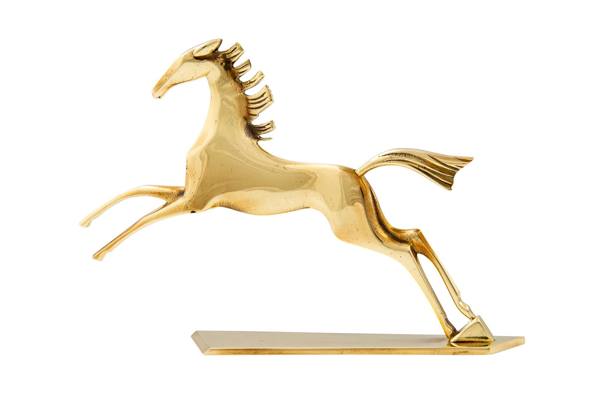 The Horse was a popular theme for the Werkstätte Hagenauer. The freedom and dynamic in the movement of this animal is what many buyers liked. This galloping depiction is especially dynamic with the horse’s mane moving in the wind. The quality of