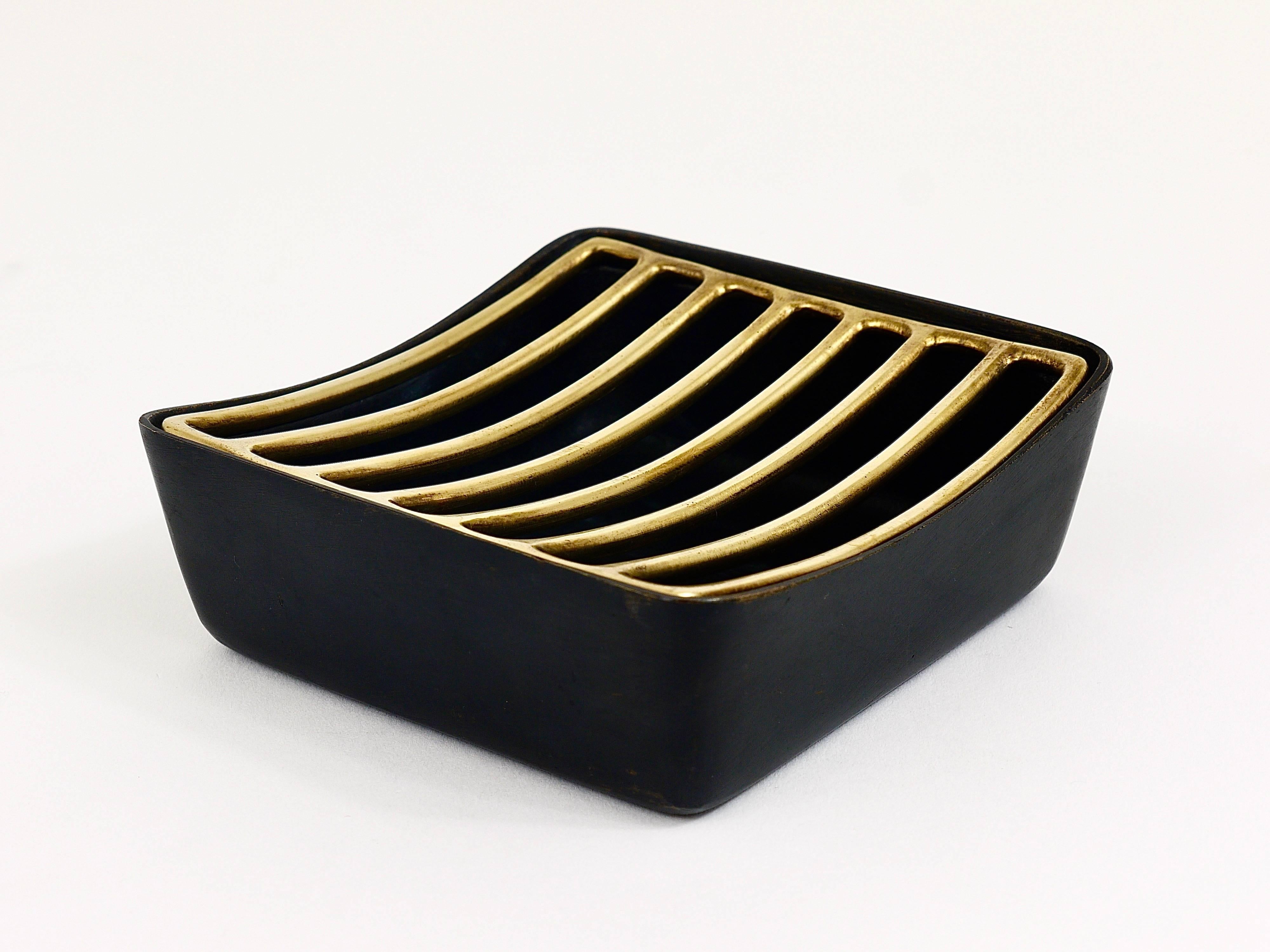 A beautiful midcentury ashtray, executed in the 1950s by Werkstätte Hagenauer, Austria, in very good condition with marginal patina. Marked on its underneath.