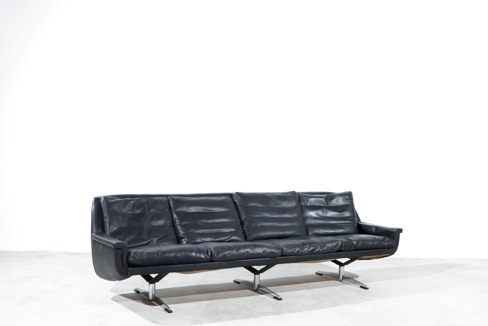ESA Moebelwerk Denmark Model 802 sofa. 

The design is from Werner Langenfeld during the 1960s.

This sofa was produced in Denmark and is made of smooth black aniline leather.

Rare model with a unique heavy steel swivel base.

Very comfortable and