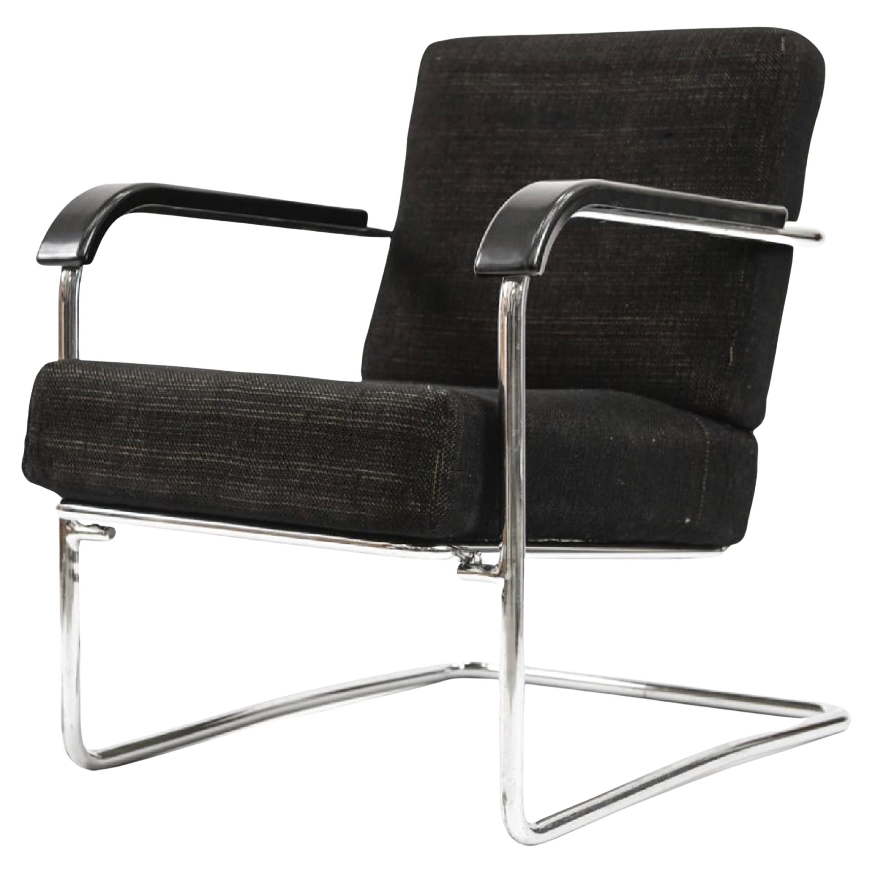 Werner Max Moser para Embru Wohnbedarf, Silla de salón WB21 Zúrich Suiza 1935.  Raro sillón de Werner Max Moser. Fabricado por Embru, Zúrich, Suiza. Tubo de acero cromado Bauhaus, reposabrazos de baquelita y tapicería de lana. Asiento y respaldo