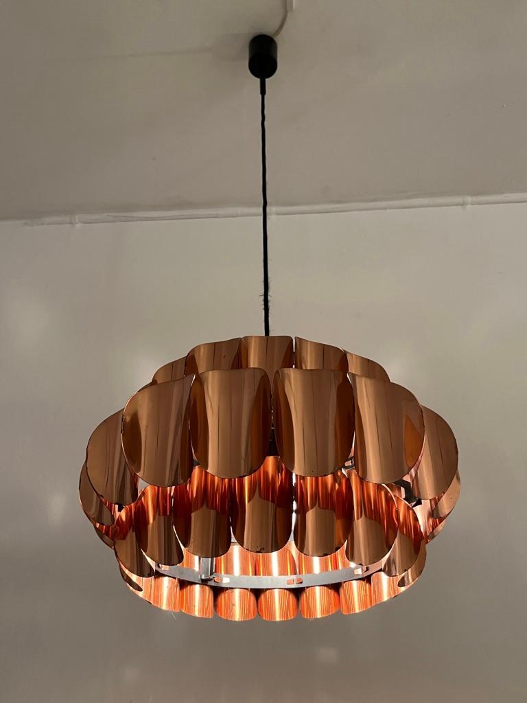 Decorative Danish copper pendant lamp by Verner Schou produced by Coronell Elektro ca. 1960s
Warm light, very good condition
D 40 x H 90 (total) H shade 25 cm.
 