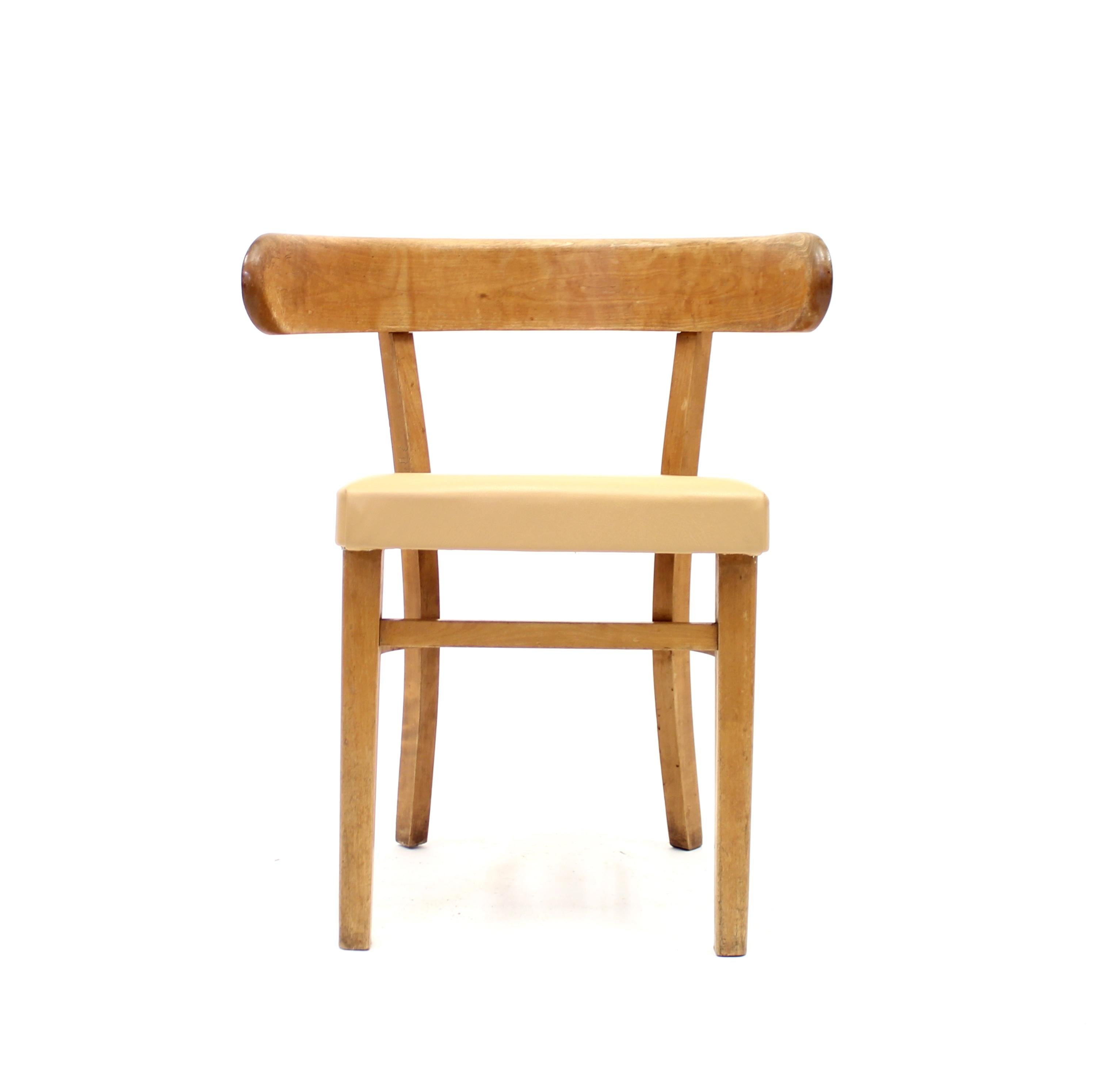 A so called hugging chair designed by Finish designer Werner West in the 1930s and manufactured by Wilhelm Schauman in the town Jyväskyle in the middle of Finland. The design of the back is heavily inspired by the Greek Klismos chairs. The frame is