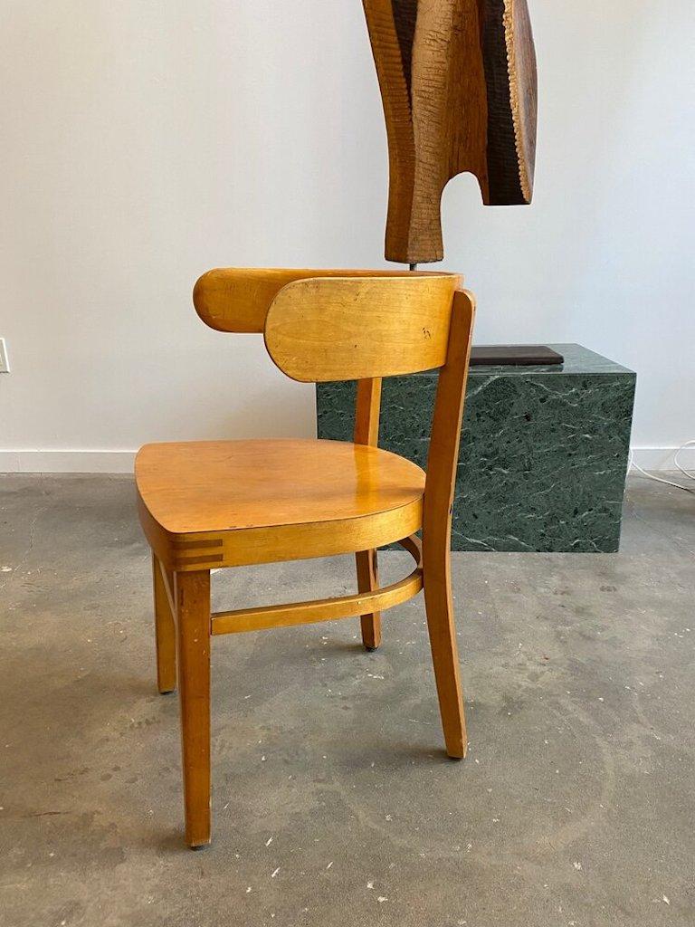 A Werner West “Hugging Chair” or known as The Tuoleja chair manufactured by Schauman Jyvaskyla Finland. Birchwood laminate with benchmade joints.