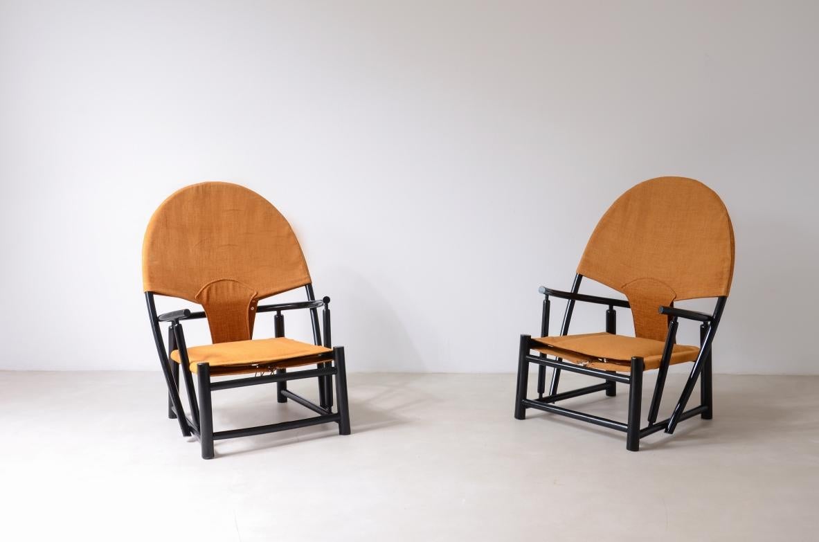 Werther Toffoloni und Piero Palange

Paar Sessel aus lackiertem Holz mit Sitz und Rückenlehne aus Stoff.

Herstellung, Germa, Italien, 1972.