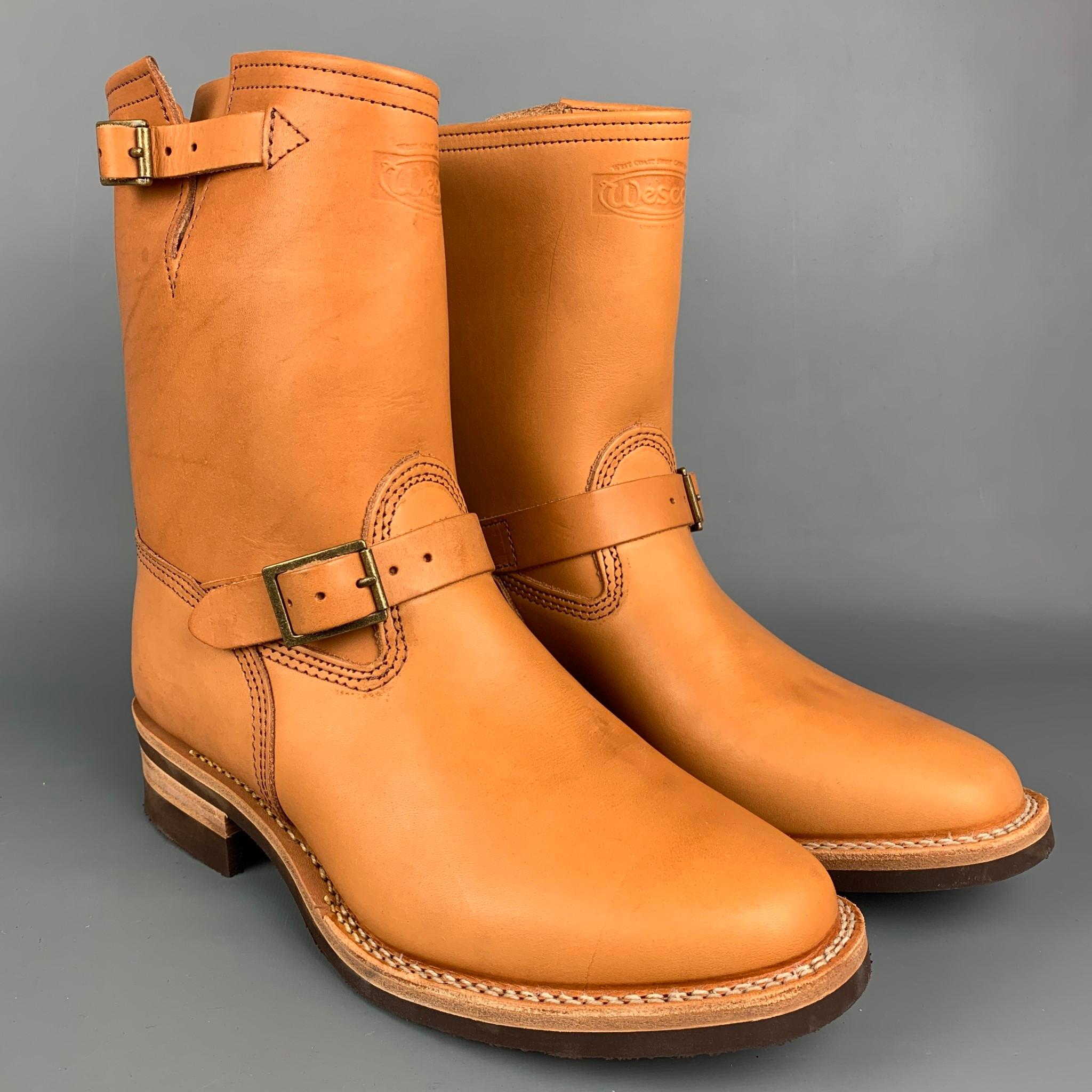 WESCO boots comes in a tan leather featuring a motorcycle style, pull on, cap toe, top stitching, and brass buckles. 

Excellent Pre-Owned Condition.
Marked: 11.5 E 11 17

Measurements:

Length: 12.5 in.
Width: 4.5 in.
Height: 10.5 in. 