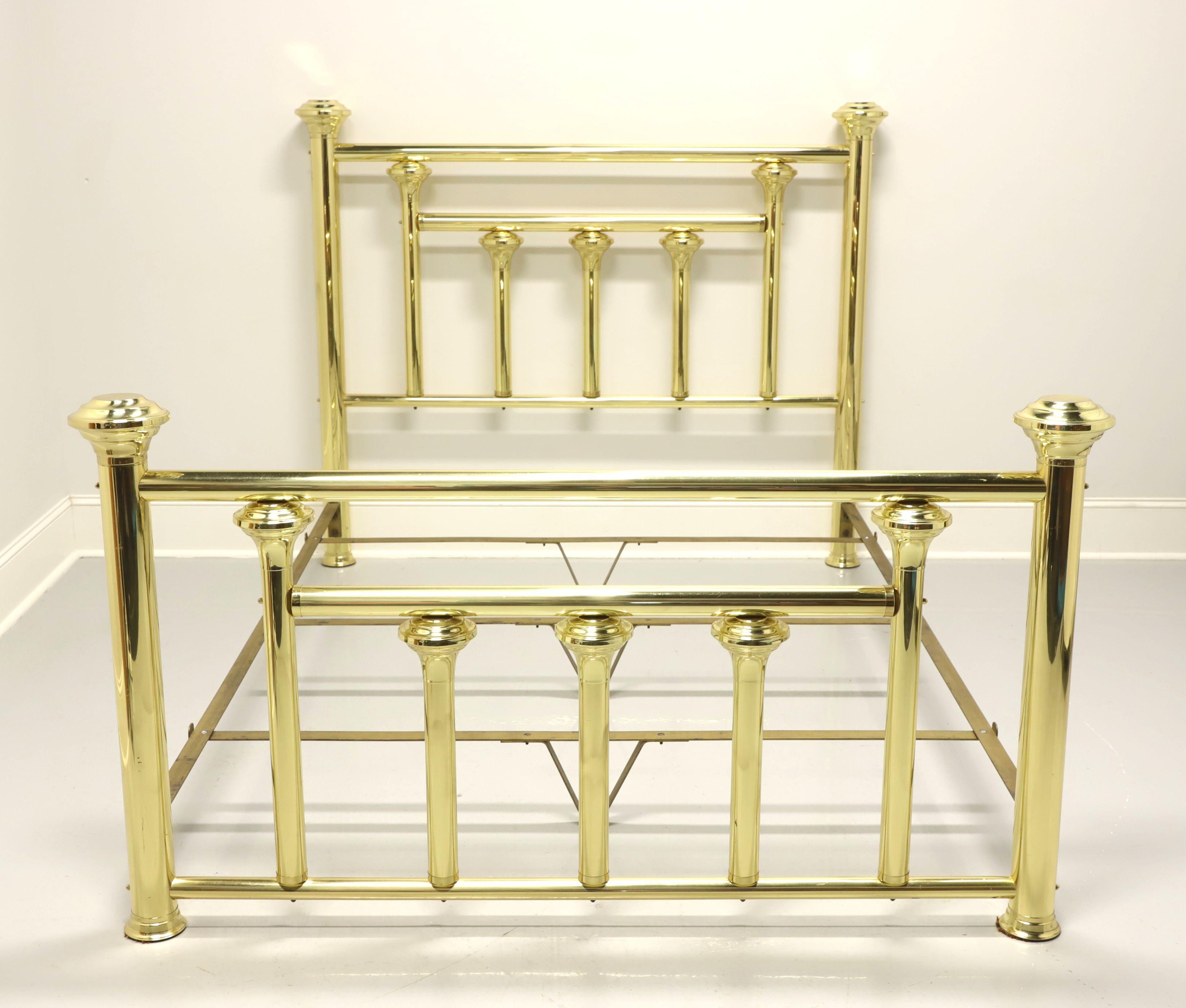 A Victorian style queen size brass bed by Wesley Allen, from their Legacy Collection. Solid brass headboard & footboard with bolt held metal side rails and metal slats. Features a headboard and footboard with large capped tubular shaped posts in an