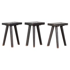 West African Relief-Carved Ebonised Stools
