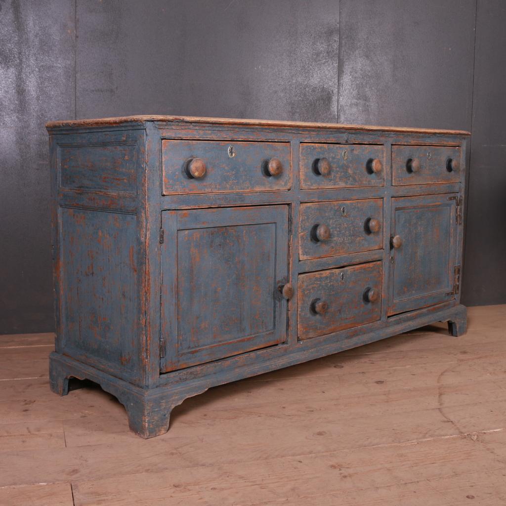 Charming 18th century painted West Country dresser base, 1790.

Dimensions
69.5 inches (177 cms) wide
23 inches (58 cms) deep
35.5 inches (90 cms) high.