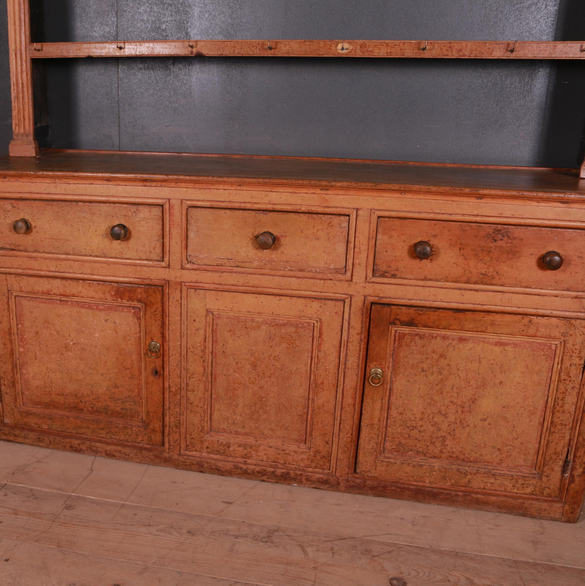 Very pretty early 19th century West Country dresser with original paint finish, 1810.

Dimensions:
69 inches (175 cms) wide
19 inches (48 cms) deep
76 inches (193 cms) high.