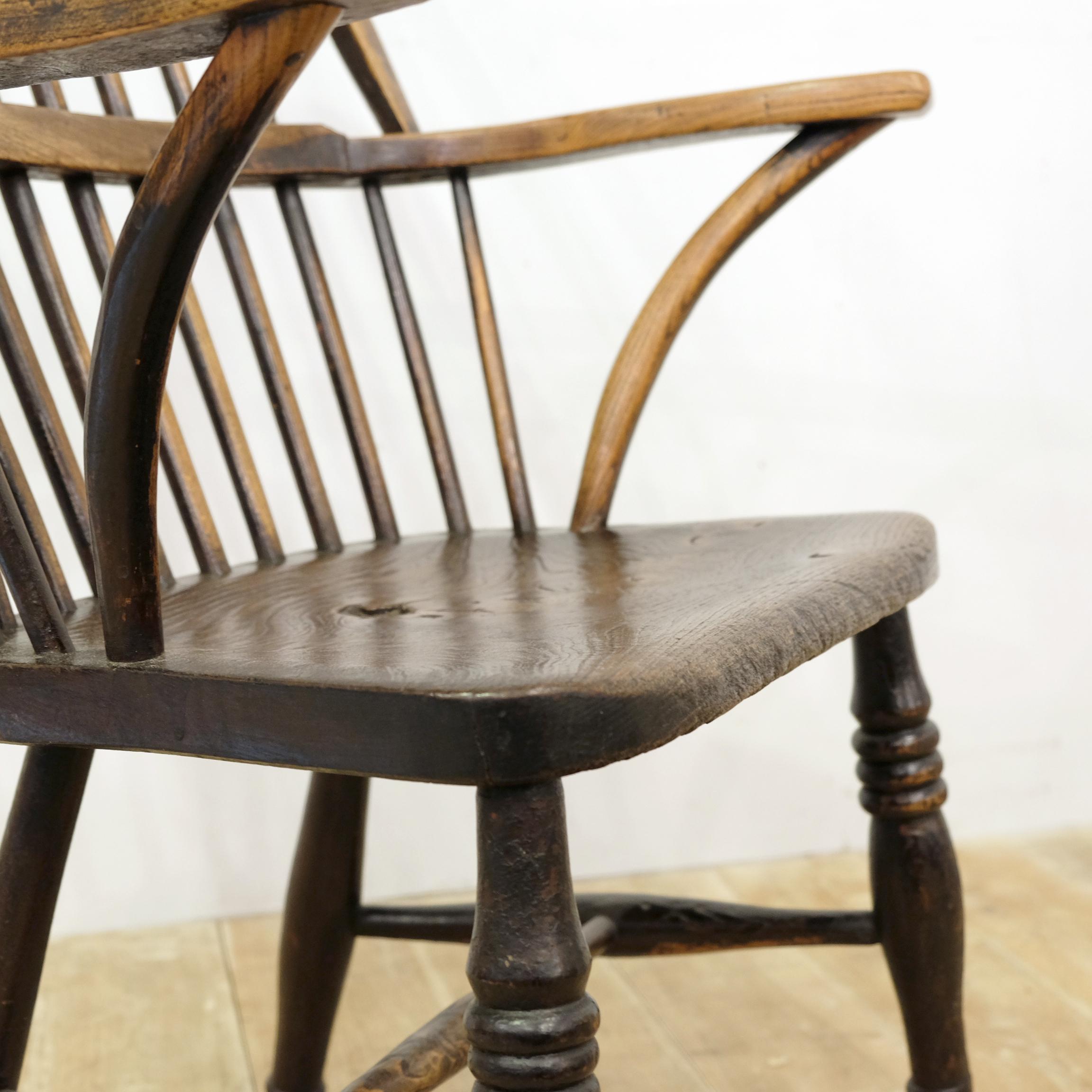 An attractive and characterful three-part arm Windsor chair in elm, birch and ash. Dating from circa 1830, it is likely from the Culm Valley area of mid Devon. Although unstamped, it bears uncanny resemblances to the chairs made by Frost and