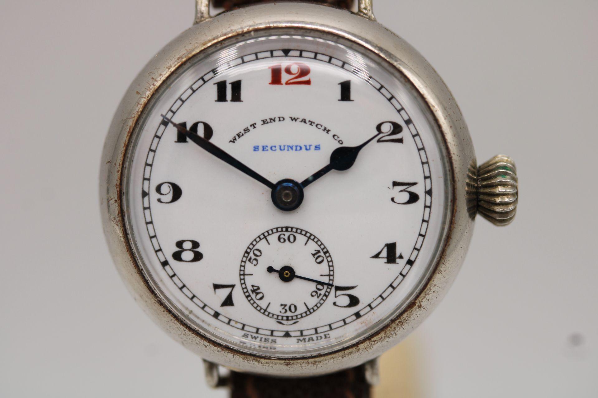 Watch: West End Watch Company - Secundus
Stock Number: CHW5424
Price: £495.00

This West End Watch Company Secundus model watch was sold and issued to the Indian Army mainly serving in 1922 across Iran, Egypt, Mesopotamia and Palestine.

Generally,