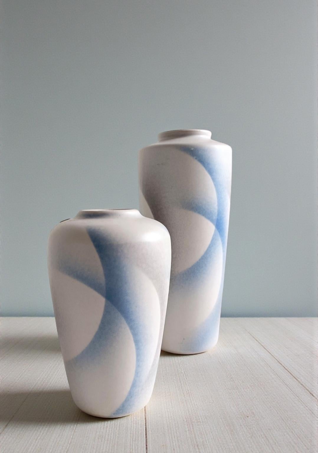 Beautiful Pair of West German Bay Keramiek Art Pottery Vases, Post-Modern / Art Deco Revival, 1980s

A very beautiful pair of West German art pottery vases by the renowned ceramic maker Bay Keramiek, each featuring a clean, minimalistic post-modern