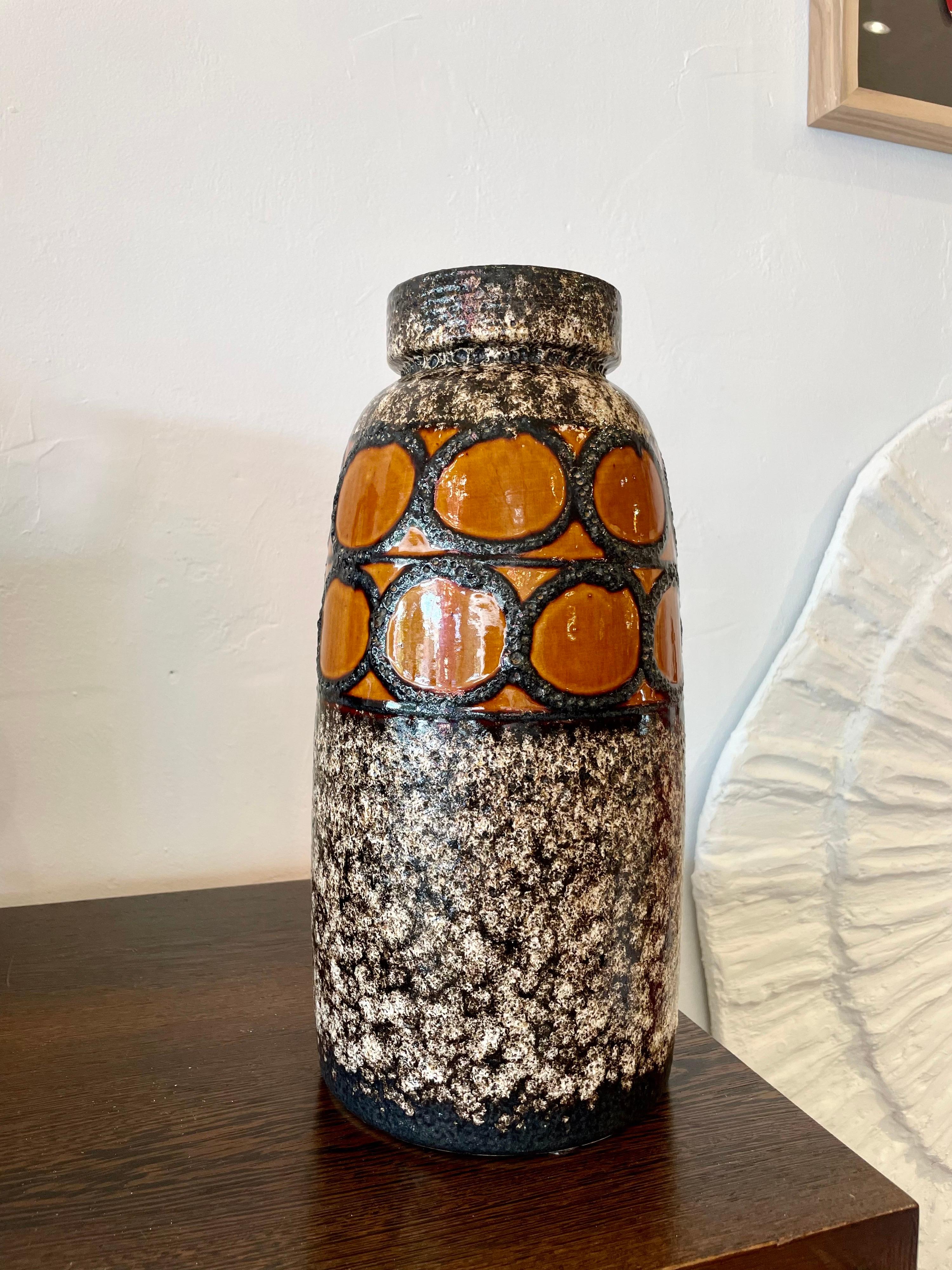 Exceptional texture and coloring, this Fat Lava finish makes this amazing West German pottery vase a rare find.