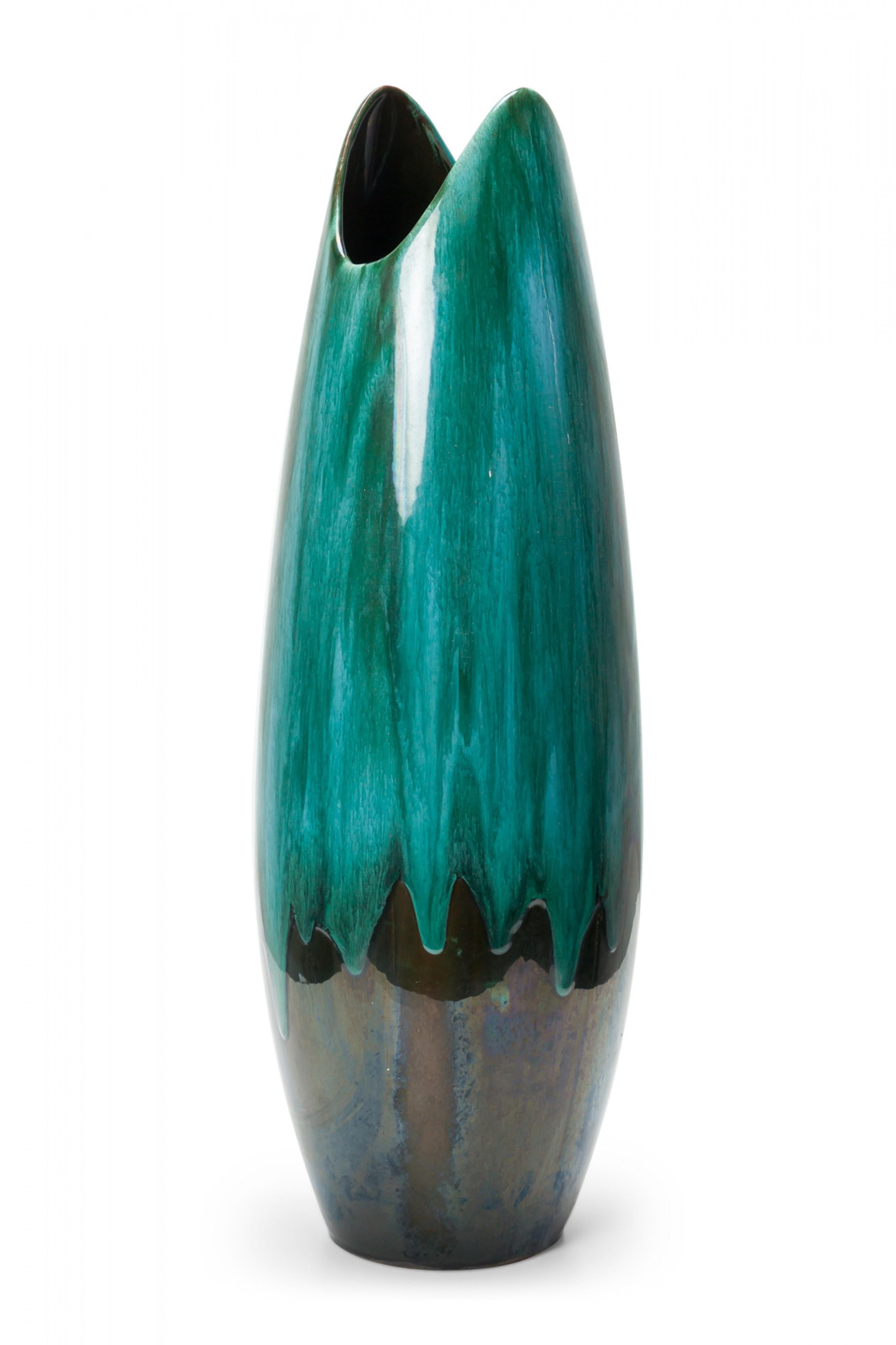 West German mid-century tapered cylindrical form ceramic vase with a scooped opening and a multi-tonal green drip glaze (mark on bottom).
   