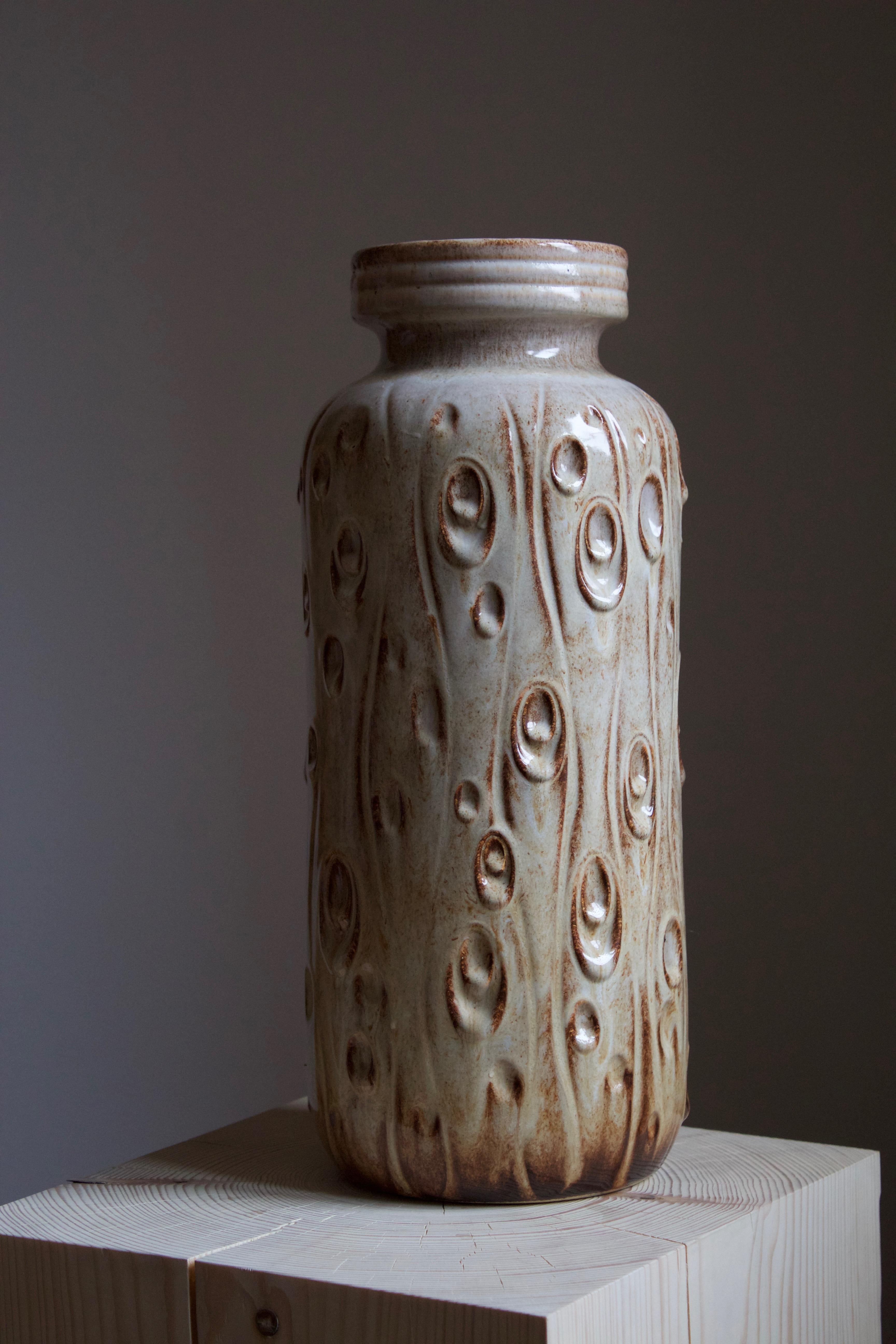 A large organic floor vase. Stamped W. Germany. 

This work is sourced in Scandinavia, where these works are commonly found. 

Other designers of the period include Axel Salto, Arne Bang, Carl-Harry Stålhane, Stig Lindberg, and Wilhelm Kåge.